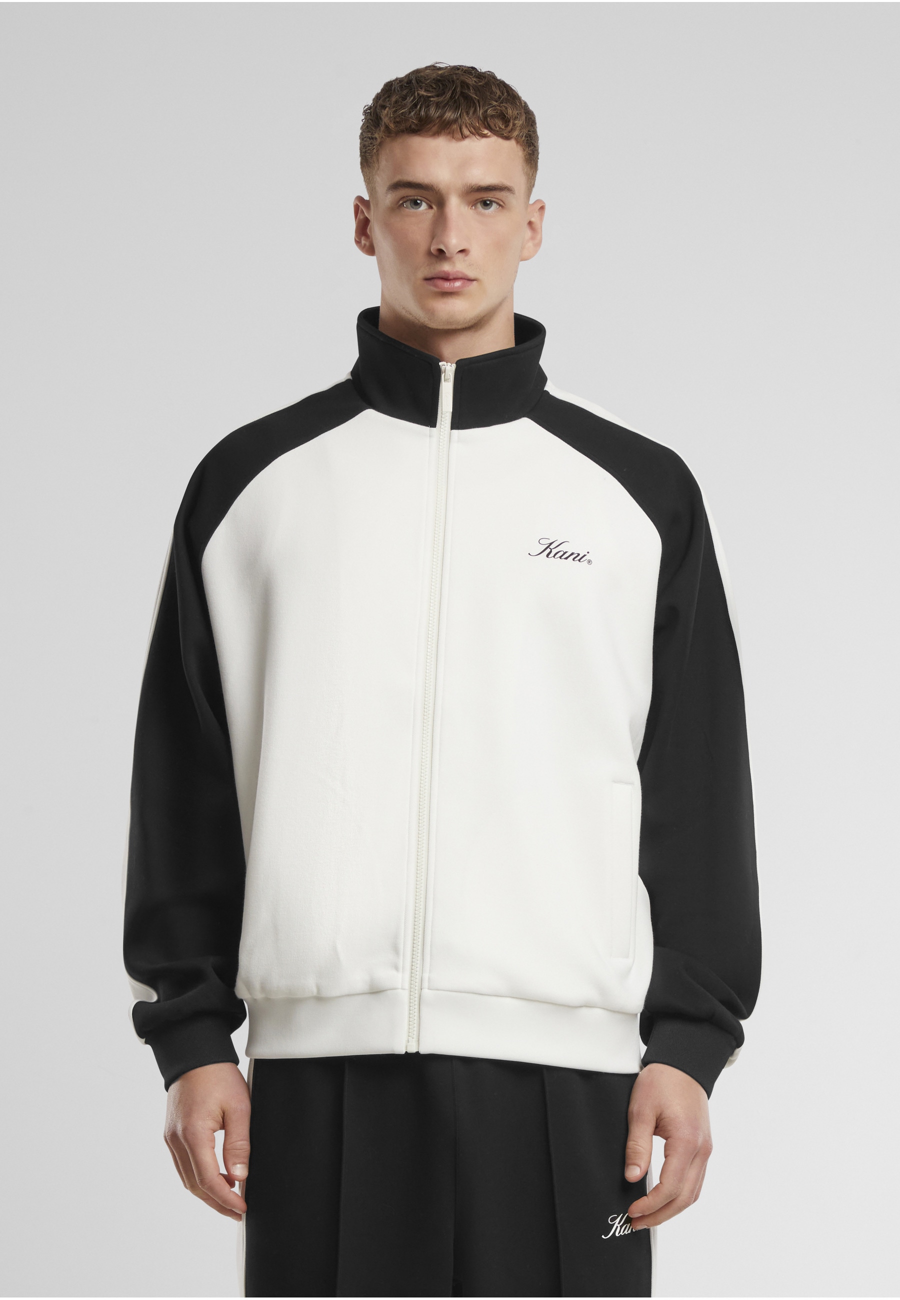 Karl Kani Trainingsjacke »Karl Kani Kani Sidestripe Trackjacket« 1 Stk. tlg. ohne Kapuze