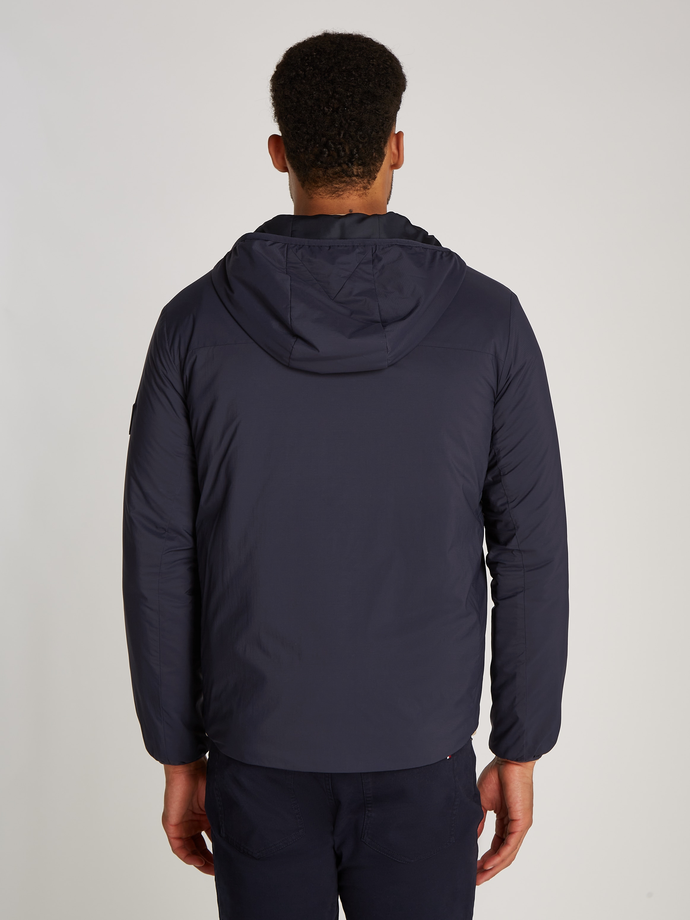 Tommy Hilfiger Kurzjacke »TECH PACKABLE HOODED JACKET«, mit Kapuze, mit Logostickerei