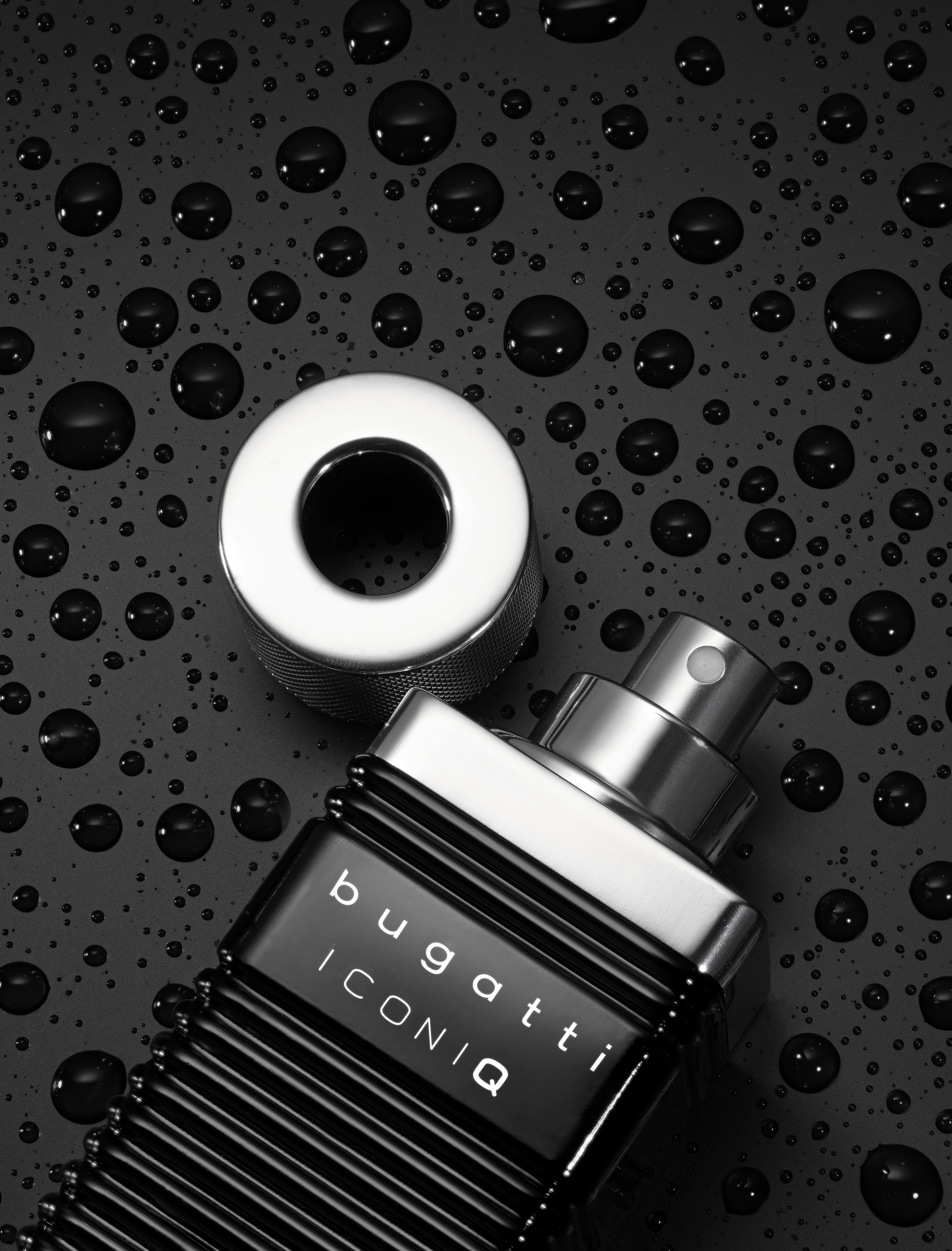bugatti Eau de Toilette »BUGATTI Iconiq Black EdT 100ml«, Würziger Herrenduft mit Kardamom, Bergamotte und warmen Holznoten.