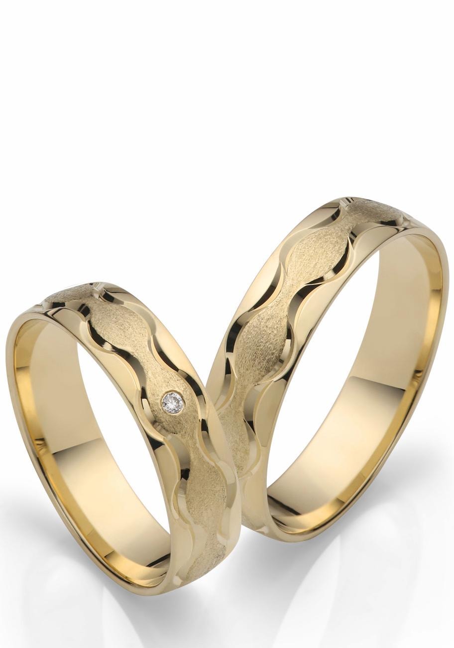 Firetti Trauring »Schmuck Geschenk Gold 375 Hochzeit Ehering "LIEBE" Welle«, Made in Germany, wahlweise mit oder ohne Brillant