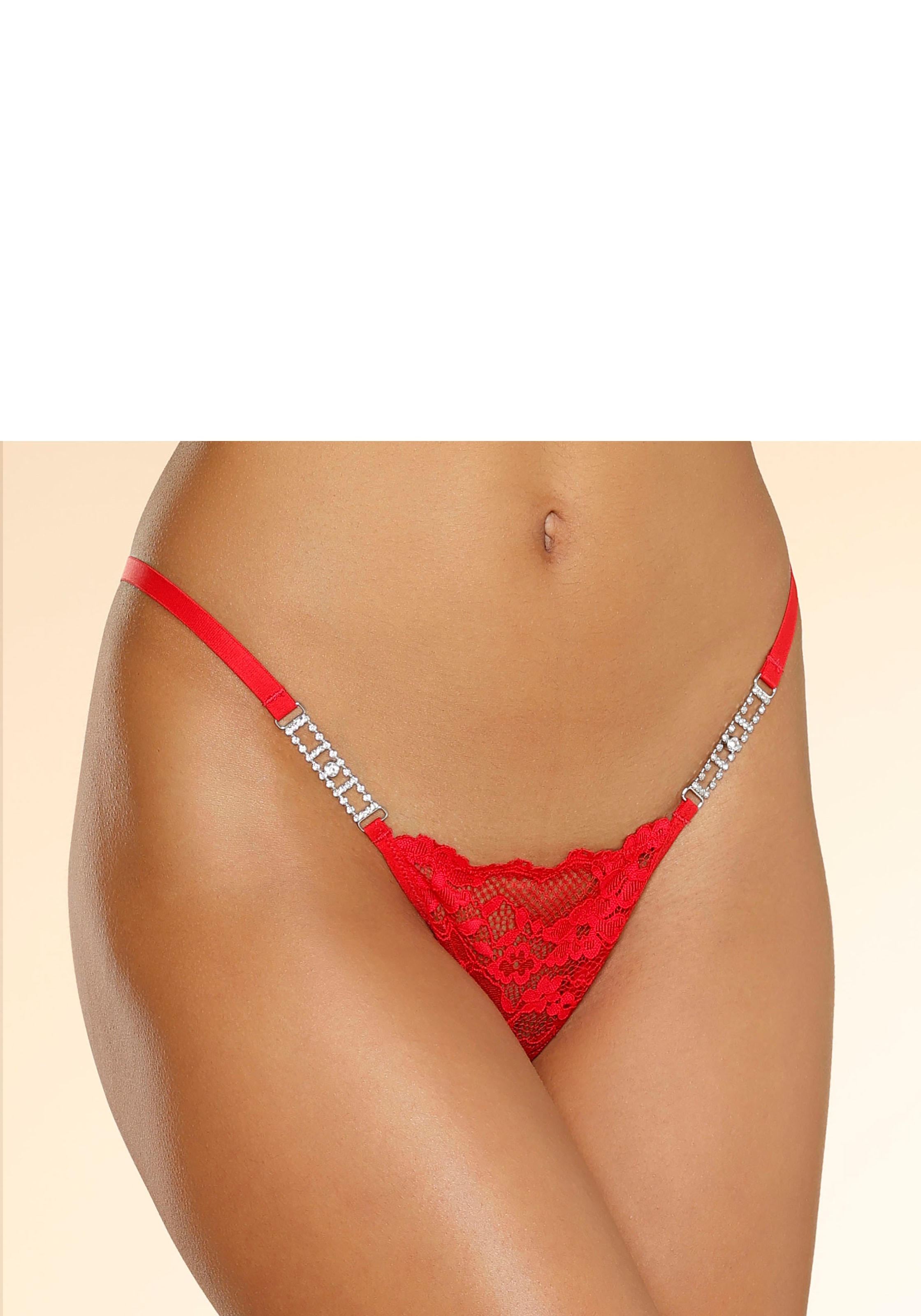 petite fleur gold String, mit extravaganten Glitzeraccessoires
