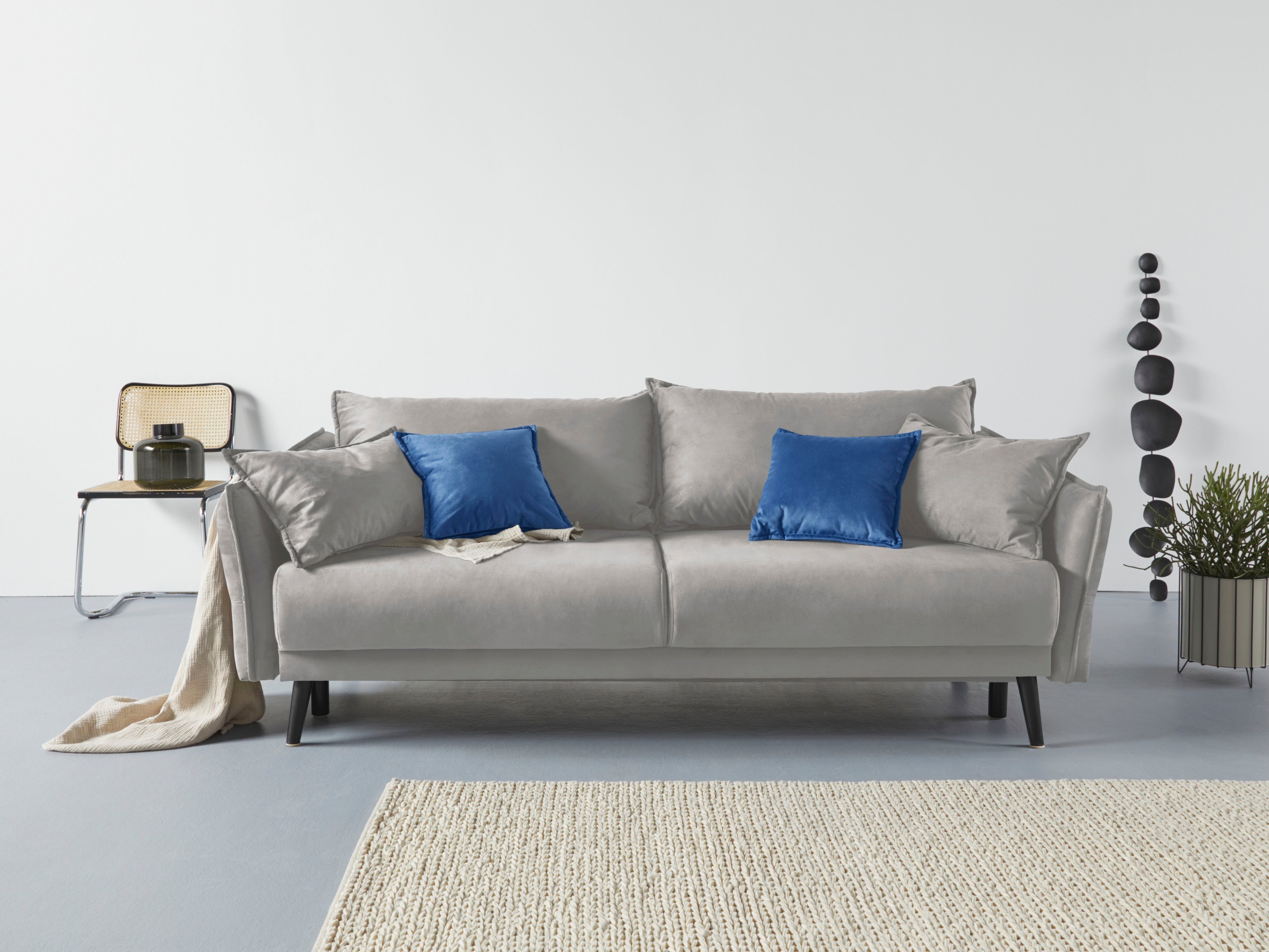 INOSIGN Schlafsofa »Asra«, incl. Bettfunktion und Bettkasten, Seitentasche im Armteil, Federkern