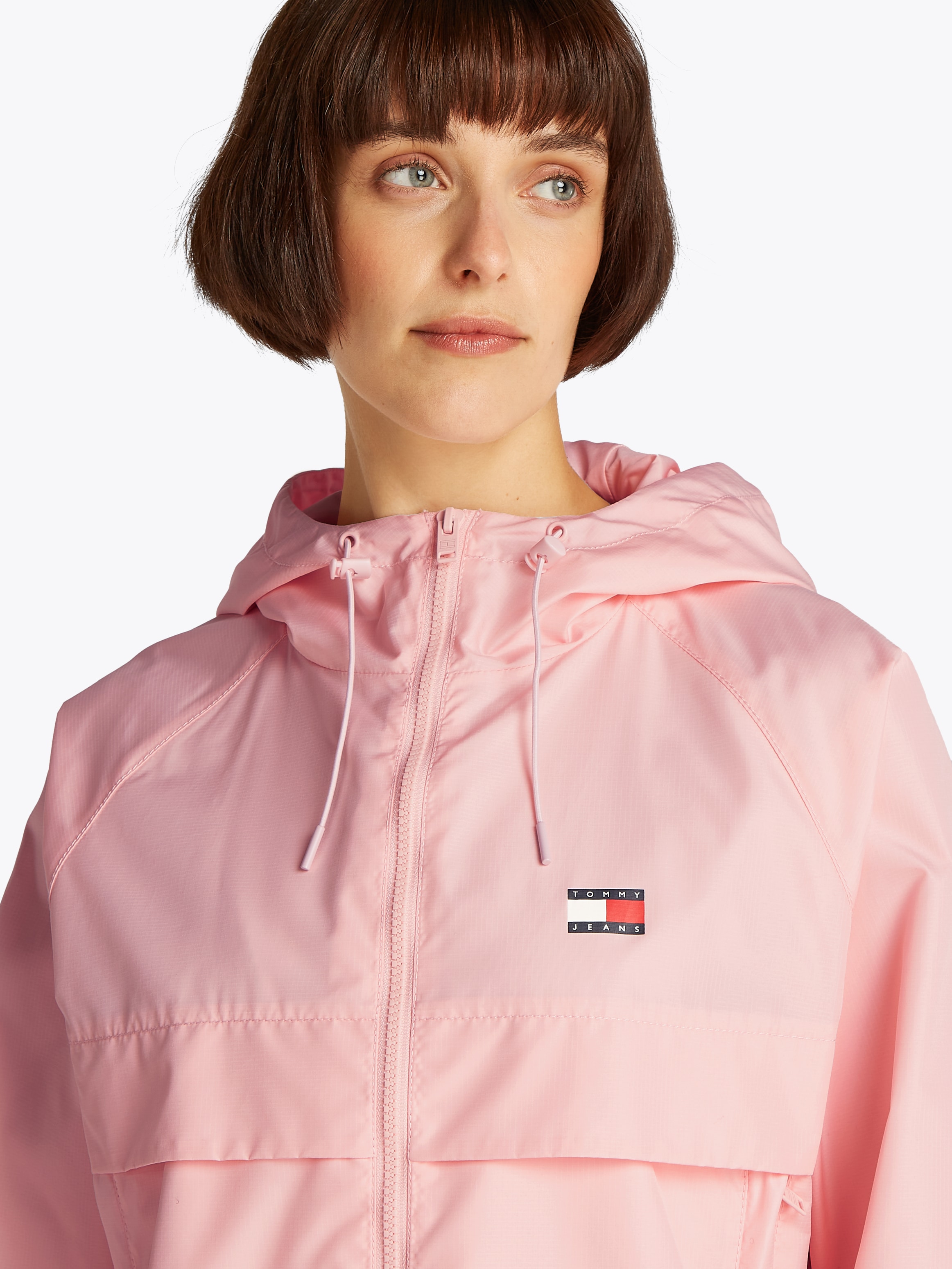Tommy Jeans Windbreaker »TJW ESSENTIAL WINDBREAKER EXT«, mit Kapuze, mit Logodruck