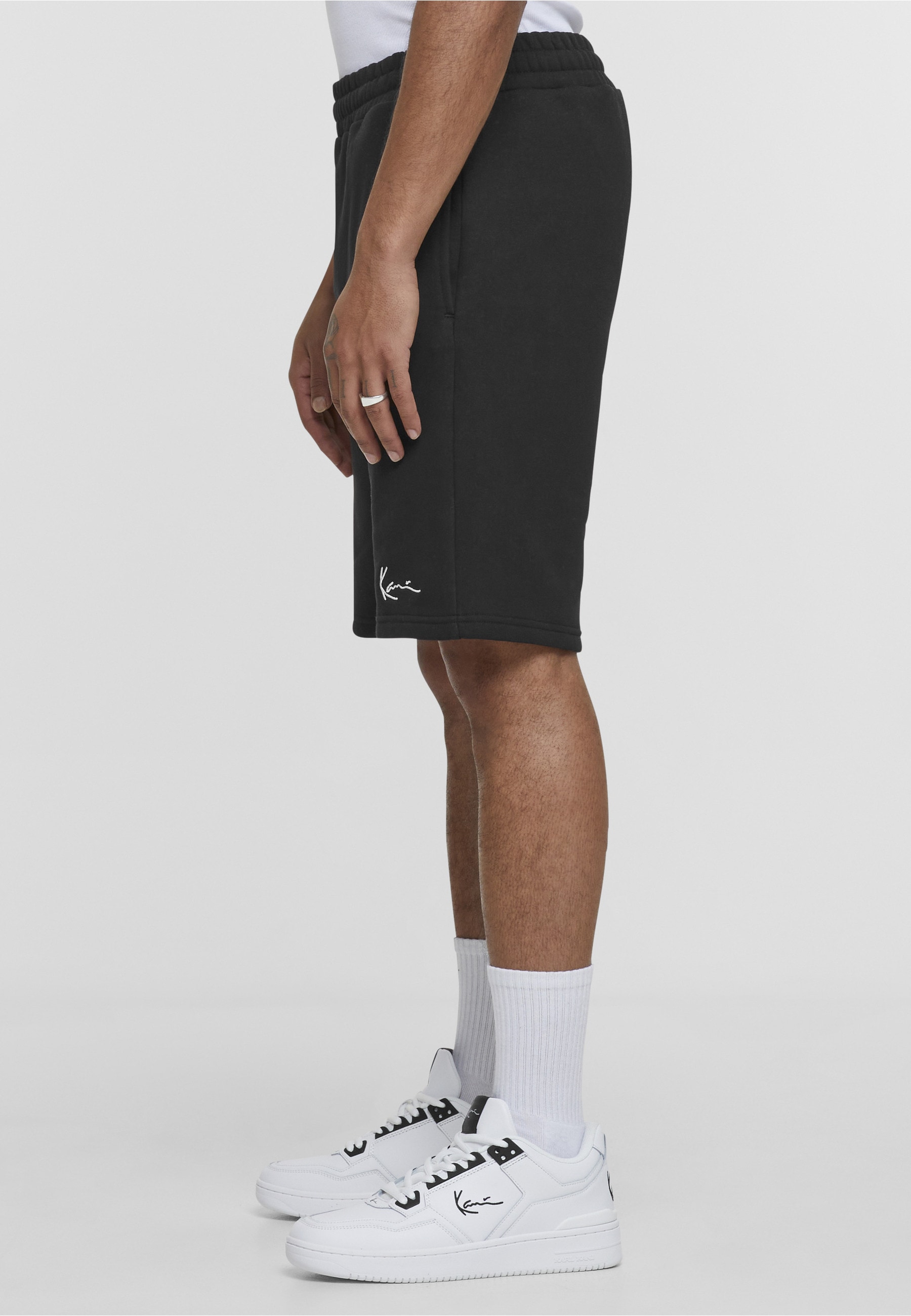 Karl Kani Stoffhose »Karl Kani Herren KKMQ22003BLK SIGNATURE SHORTS BLK«