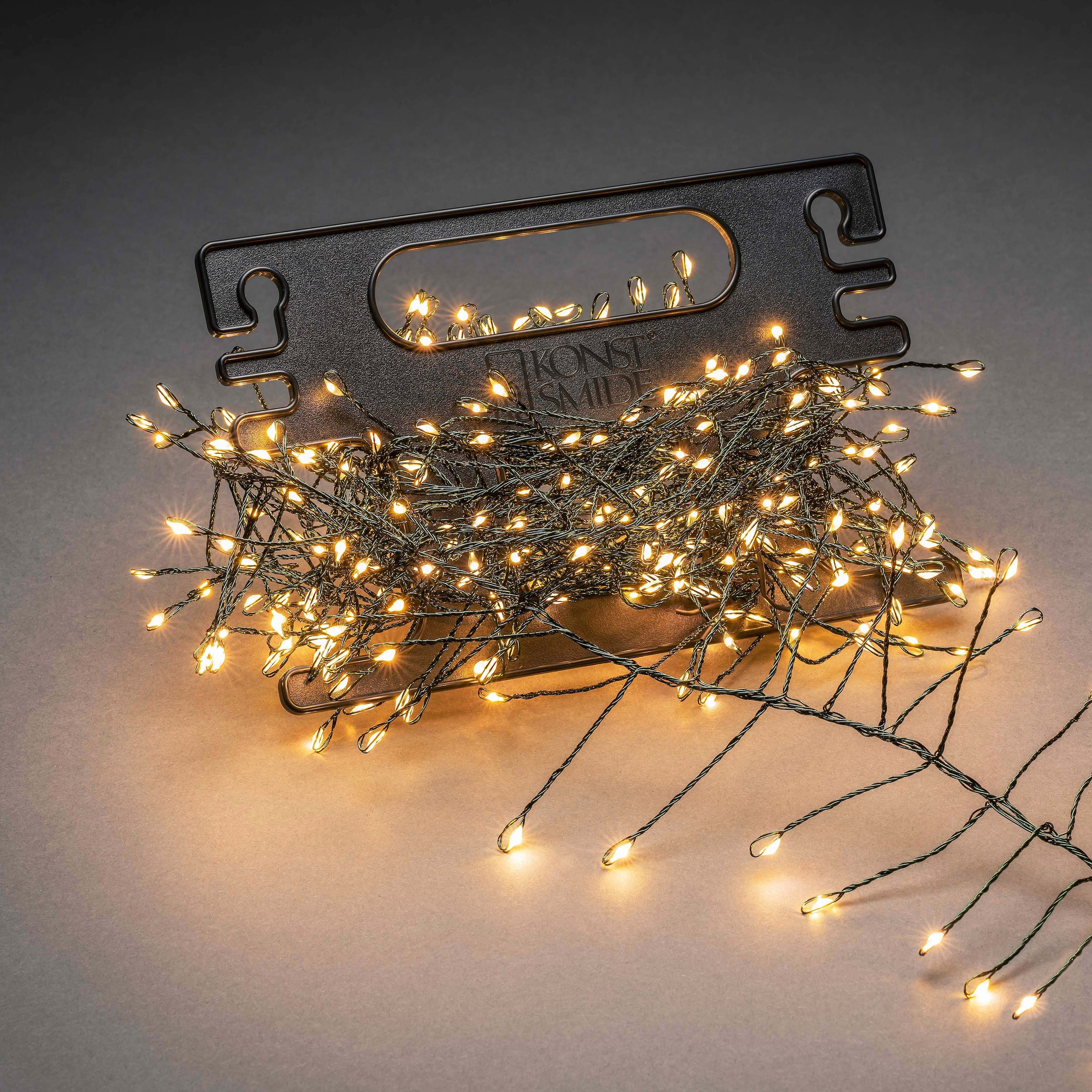 KONSTSMIDE LED-Lichterkette »Weihnachtsdeko aussen«, 400 St.-flammig, Micro  LED Büschellichterkette Cluster, mit Aufroller auf Rechnung kaufen