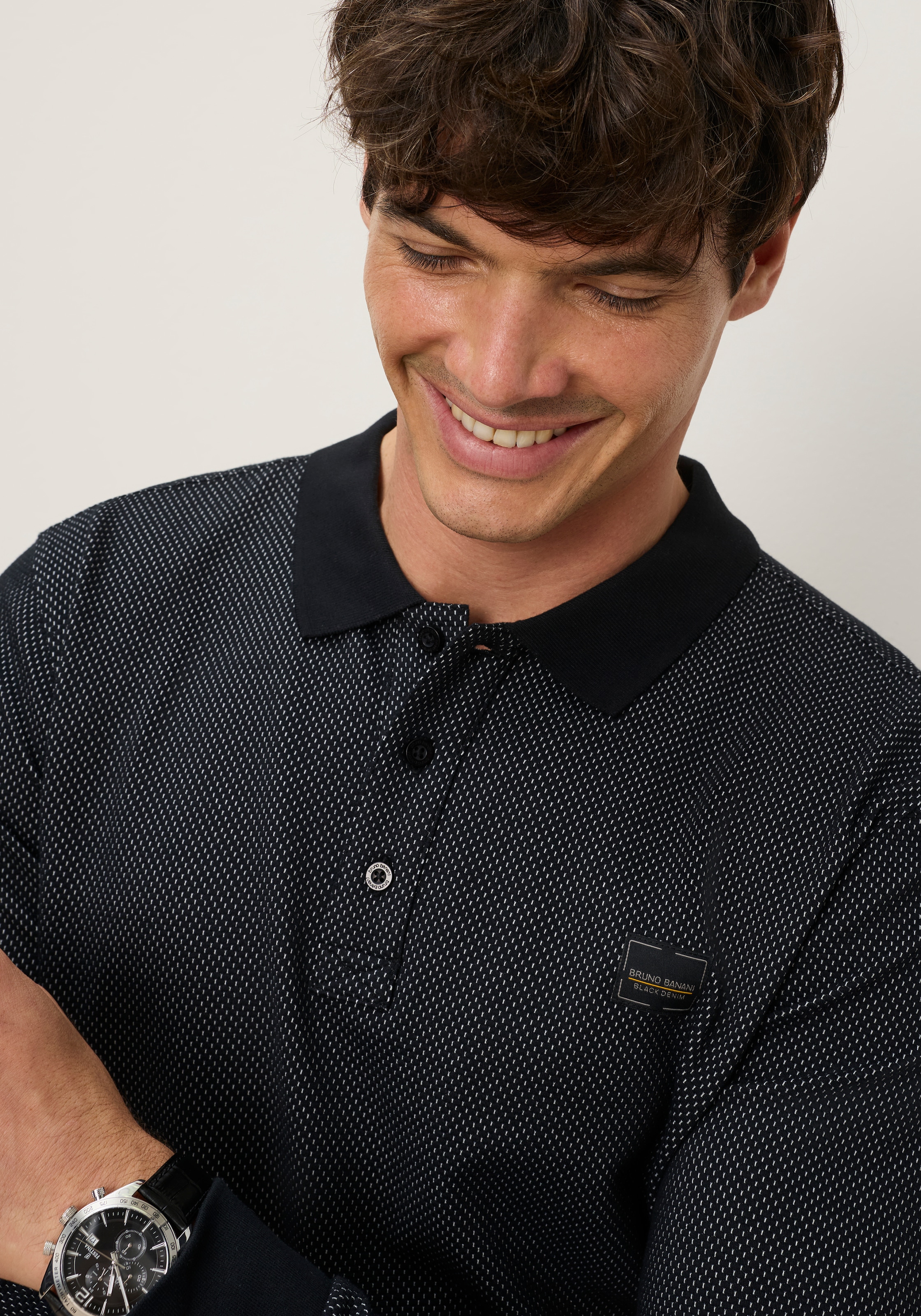 Bruno Banani Poloshirt Markante Melange-Struktur trifft auf zeitlosen Polo-Style