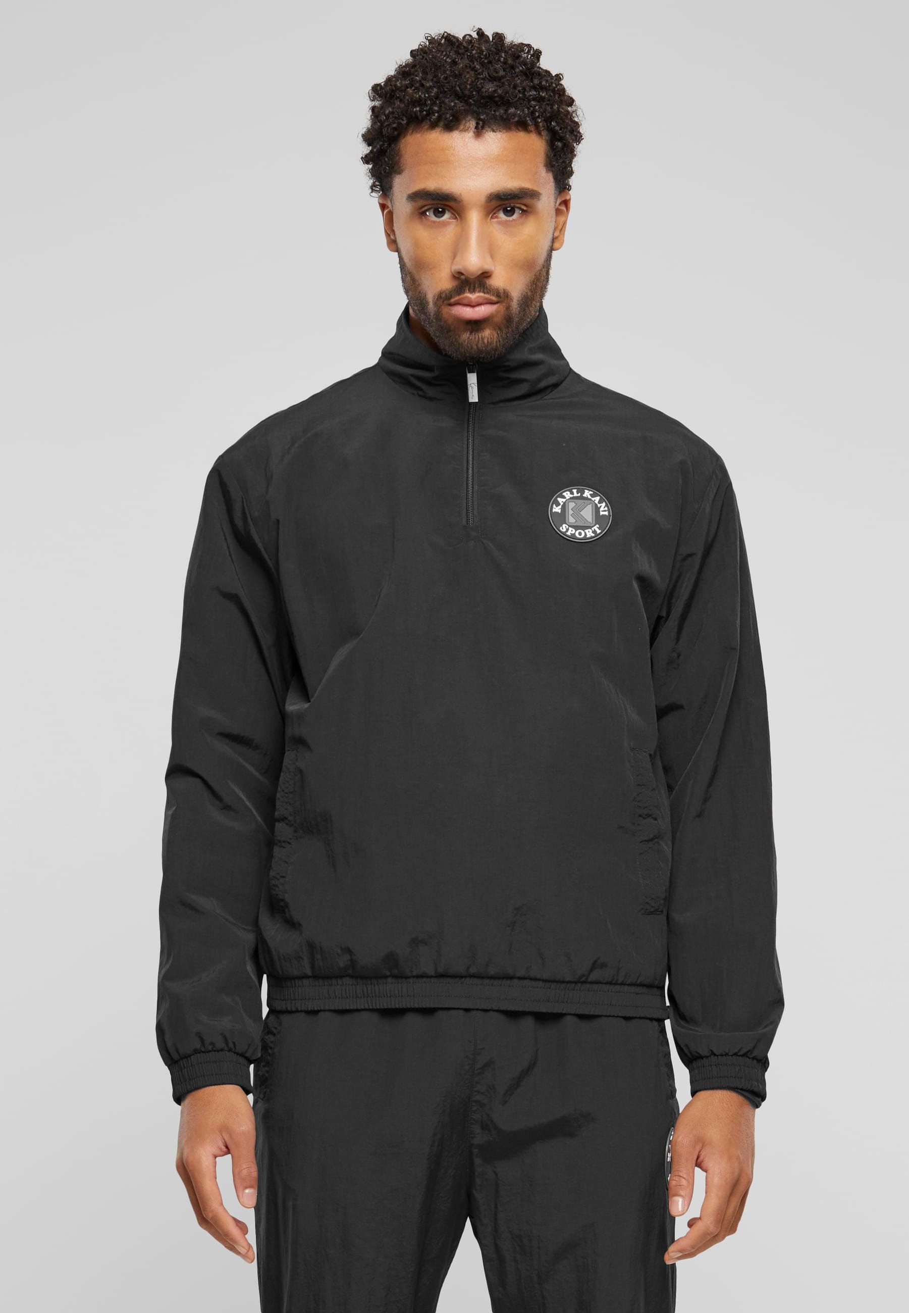 Karl Kani Allwetterjacke »Karl Kani Herren KM241-045-2 Karl Kani Og Track Troyer« 1 Stk. tlg. ohne Kapuze