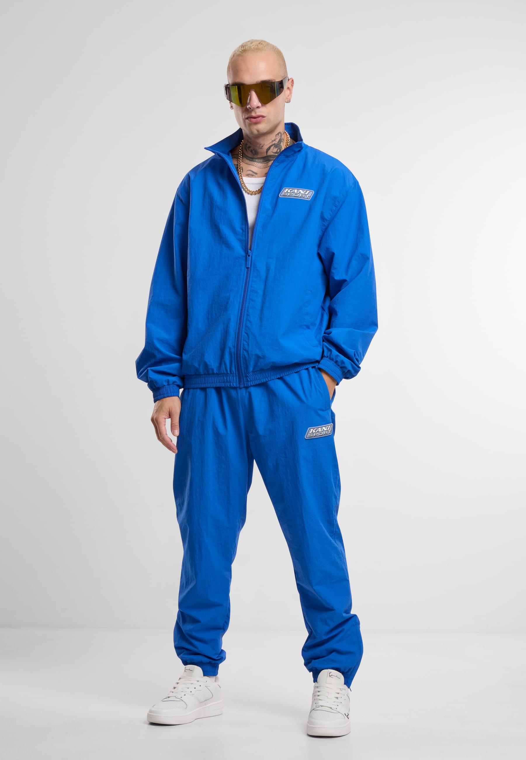 Karl Kani Trainingsjacke »Karl Kani Sport Patch Essential Trackjacket« 1 Stk. tlg. ohne Kapuze