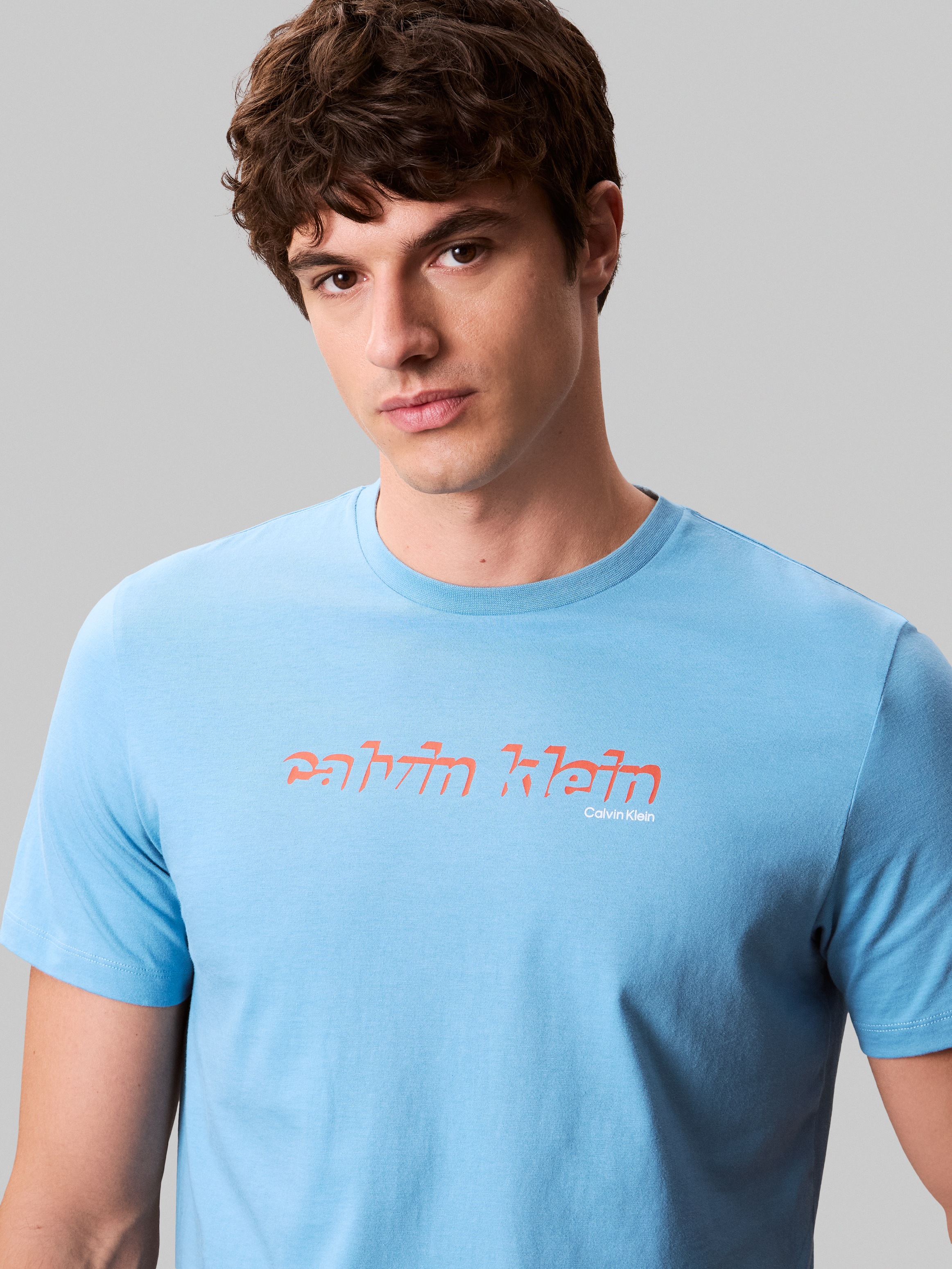 Calvin Klein Jeans T-Shirt »SS 30s E CLVN LN 3D«, Mit Rundhalsausschnitt