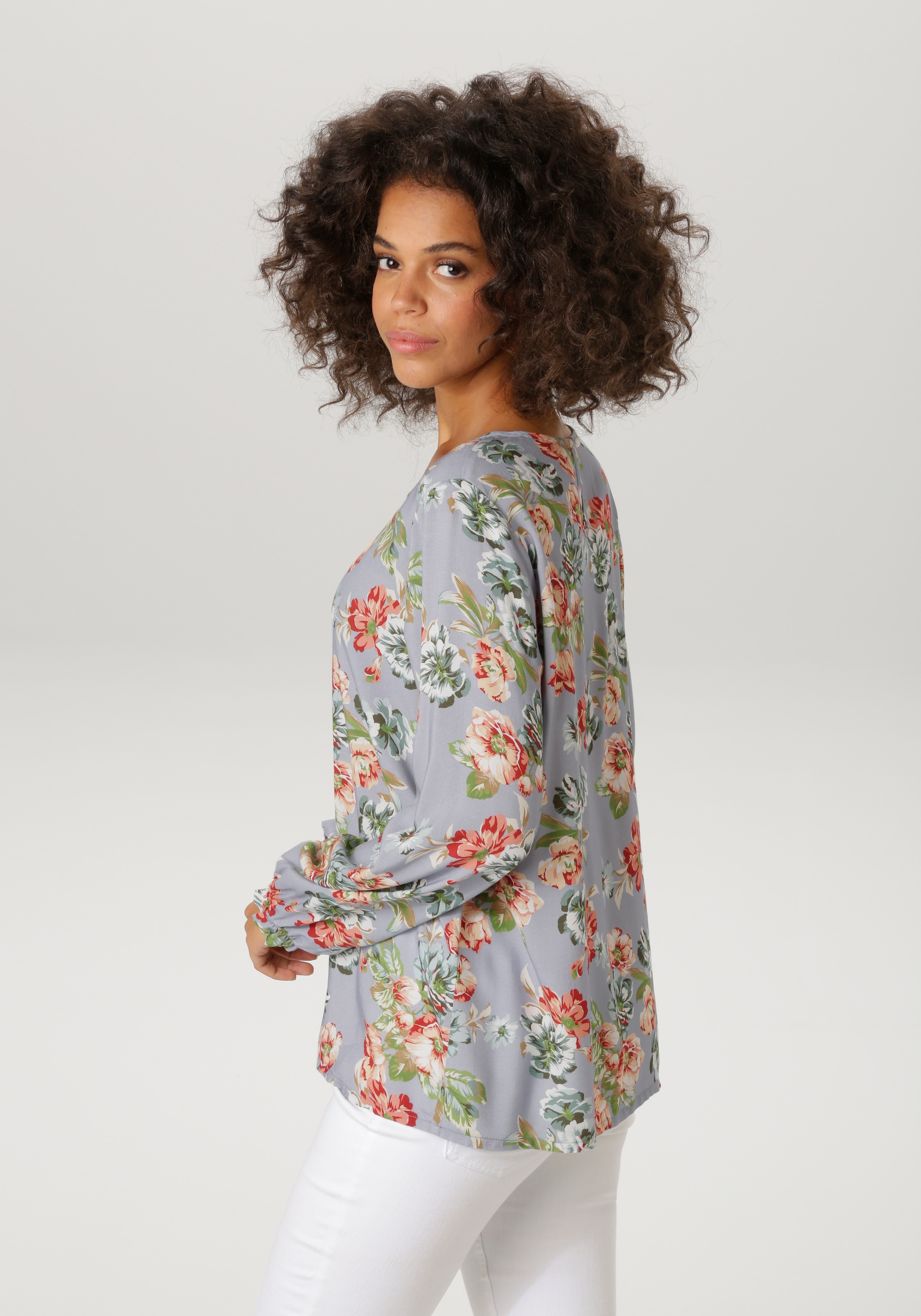 Aniston CASUAL Schlupfbluse mit farbenfrohen Blumendruck - jedes Teil ein Unikat