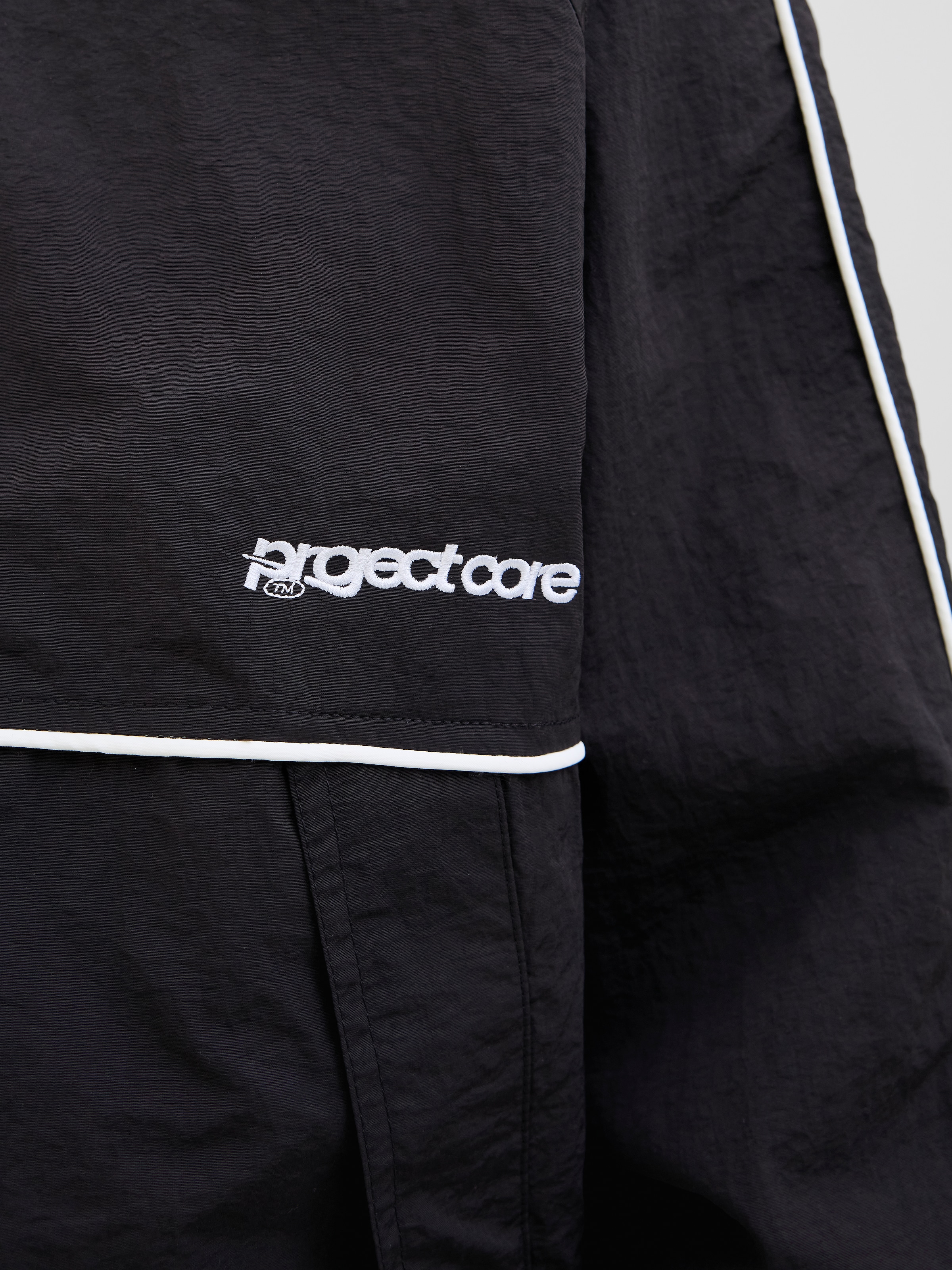 Jack & Jones Outdoorjacke »JCOUNION TRACK JACKET SN«, ohne Kapuze, Mit stylischem Print