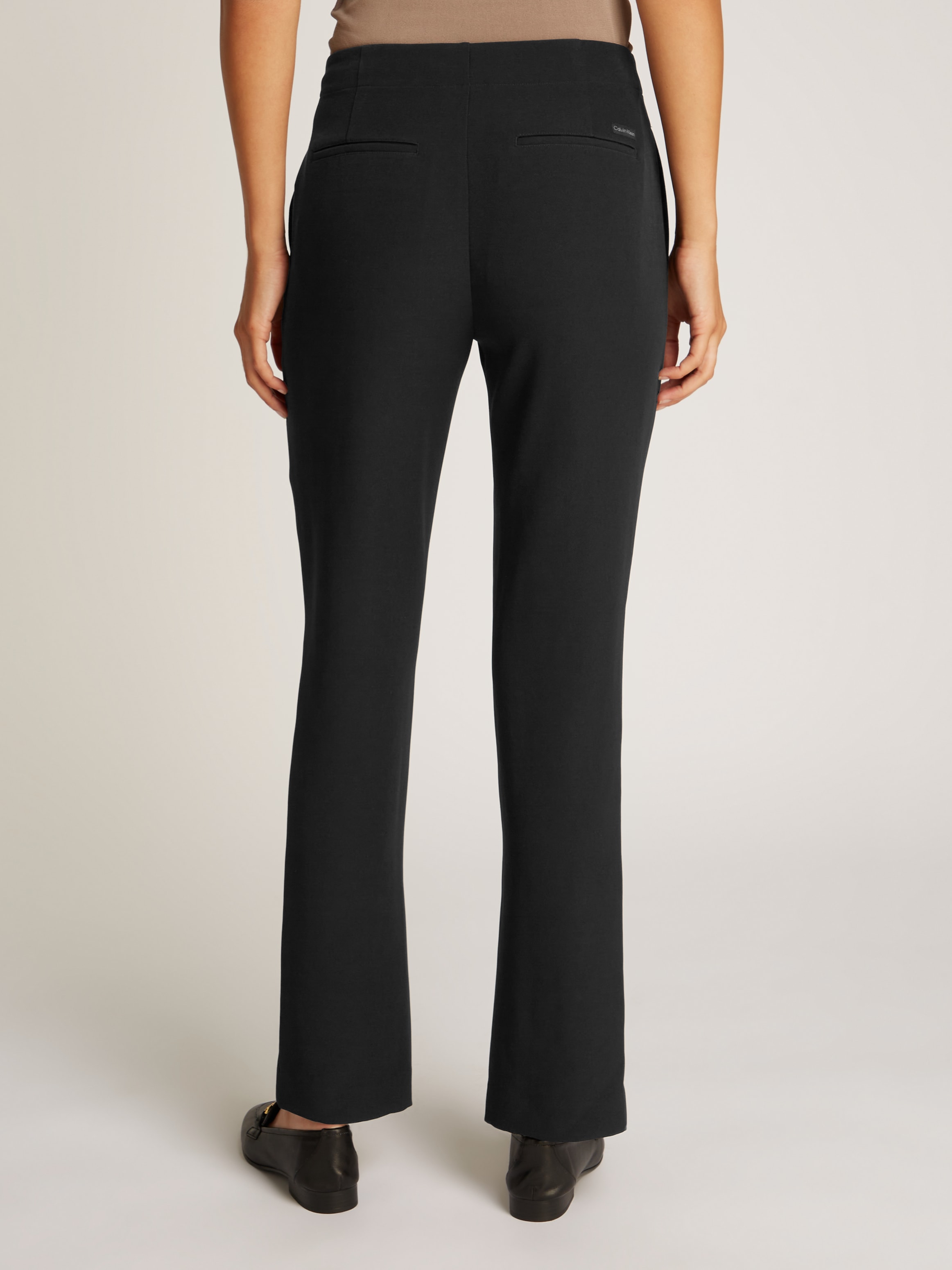 Calvin Klein Jeans Bootcuthose »SPLIT HEM SLIM LEG PANT«, Gesäßtaschen, Logodruck