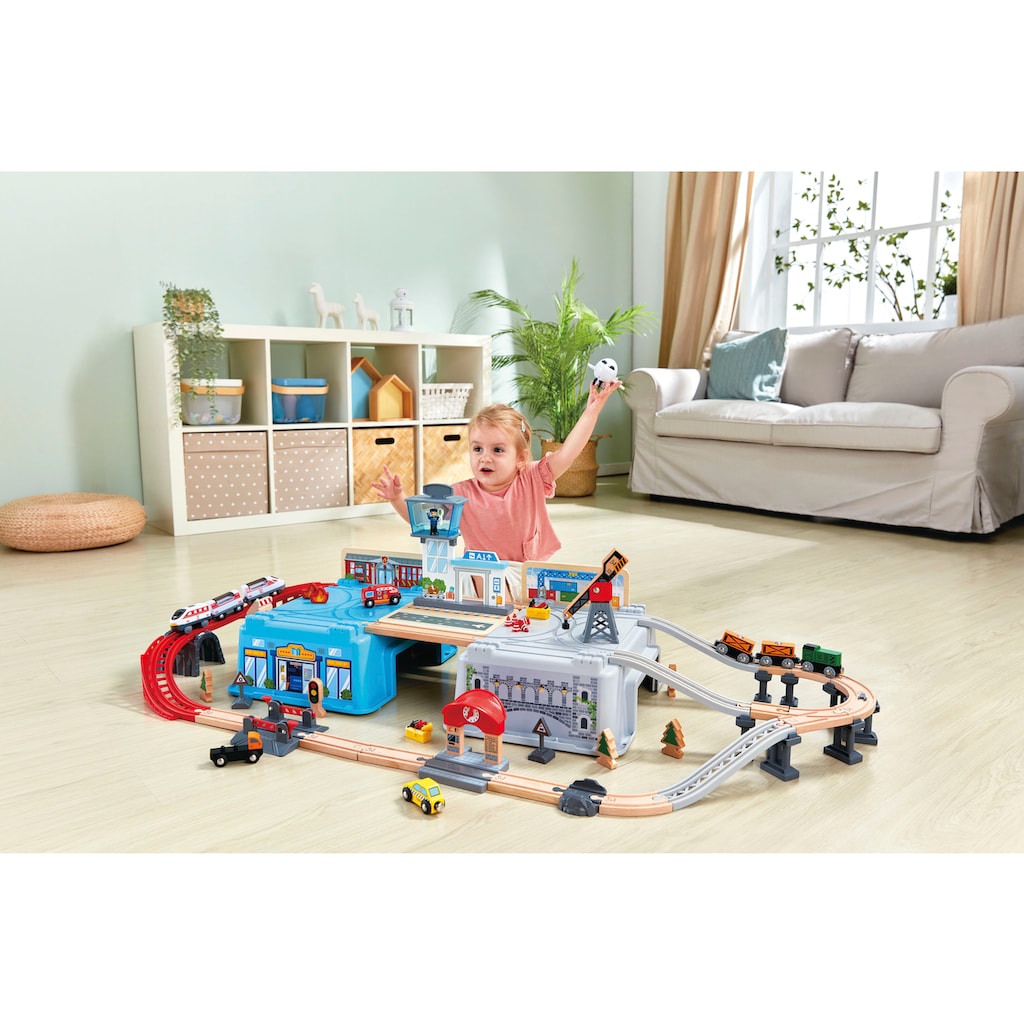 Hape Spielzeug-Eisenbahn »Großstadtlandschaft Eisenbahn in Aufbewahrungsbox«