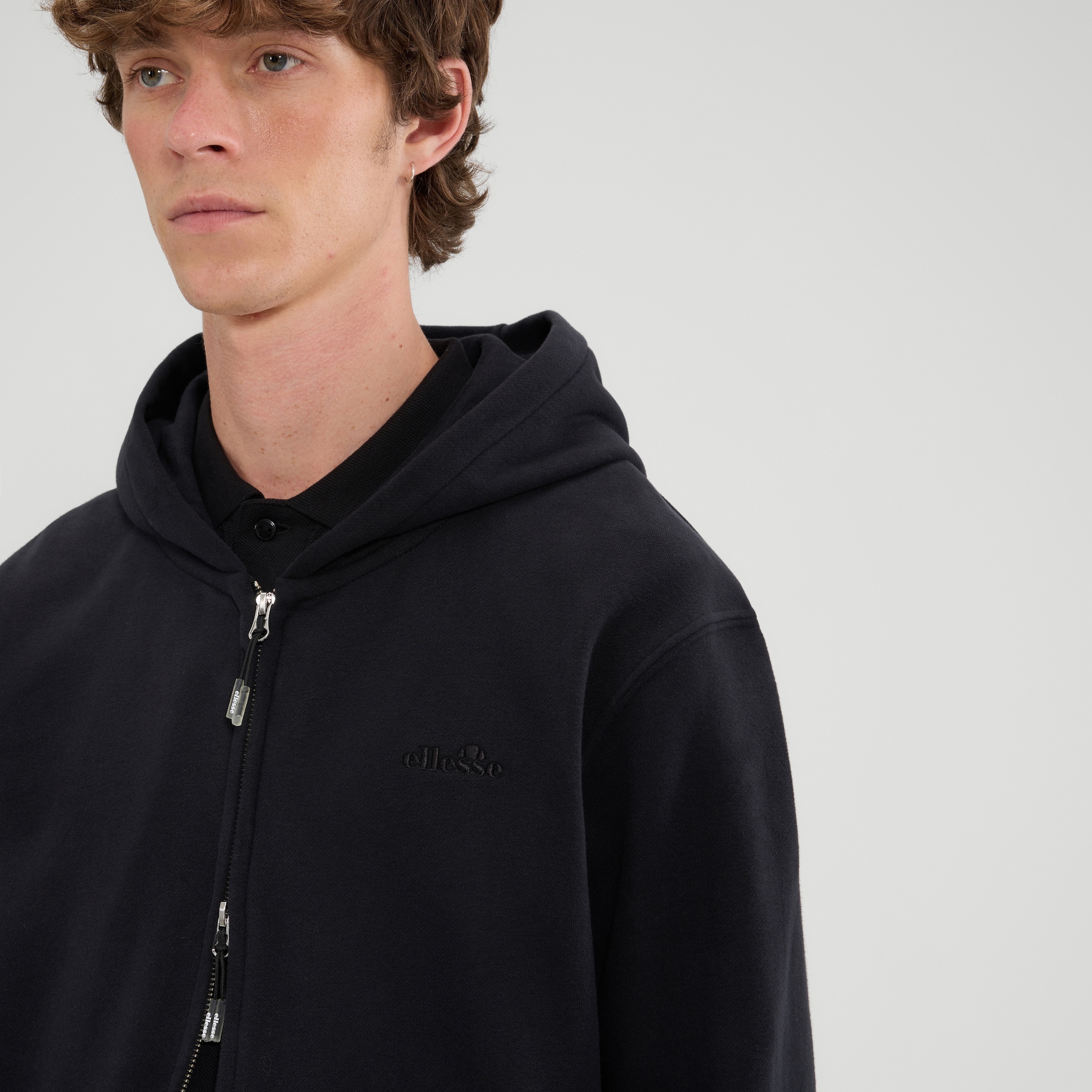 Ellesse Kapuzensweatjacke »TAURASI FZ HOODY« mit 2-Wege-Reißverschluss, aus Polyester und Baumwolle