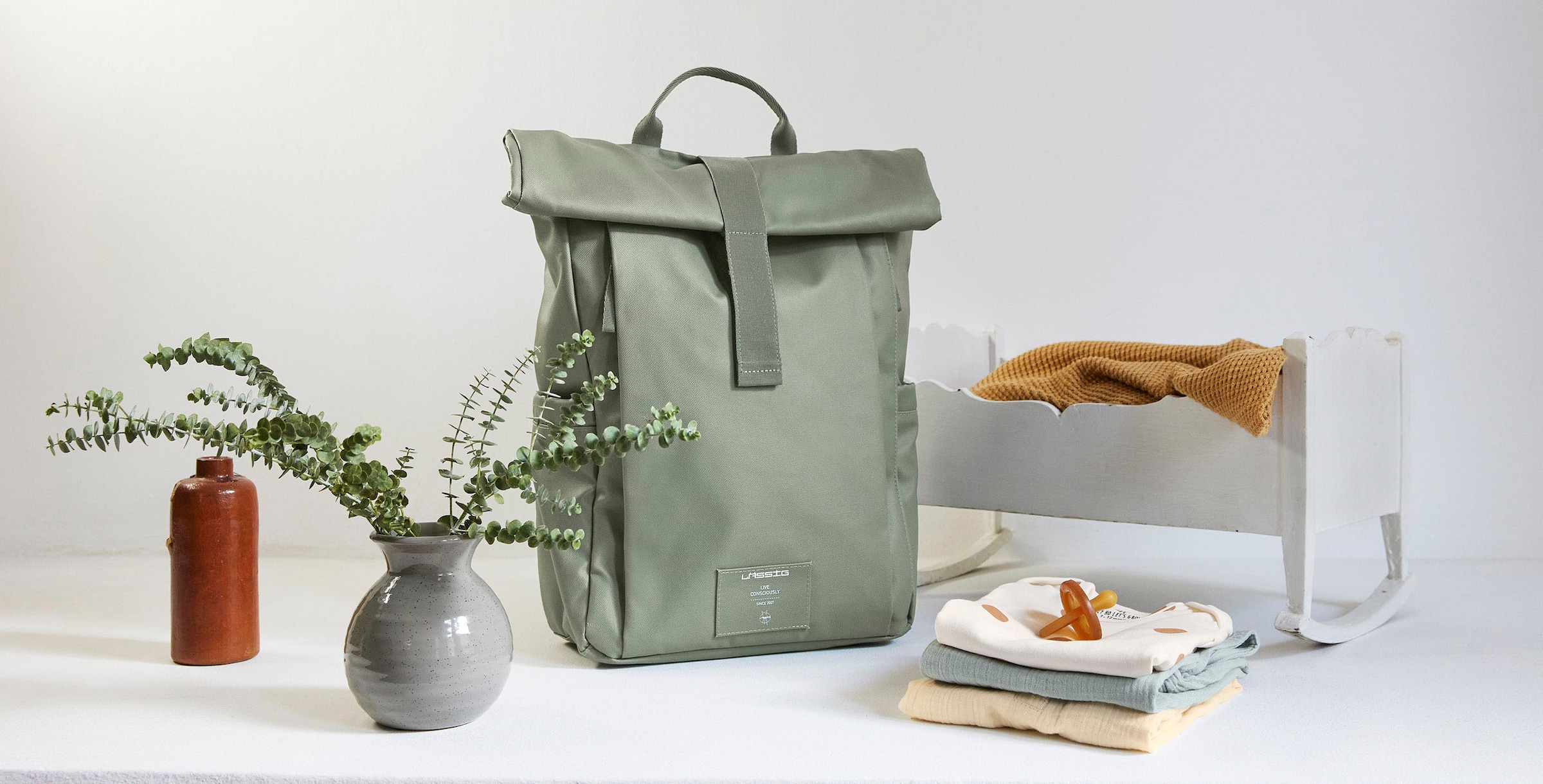 LÄSSIG Wickelrucksack »Green Label, Rolltop Up, silver green«, vegan; zum Teil aus recyceltem Material