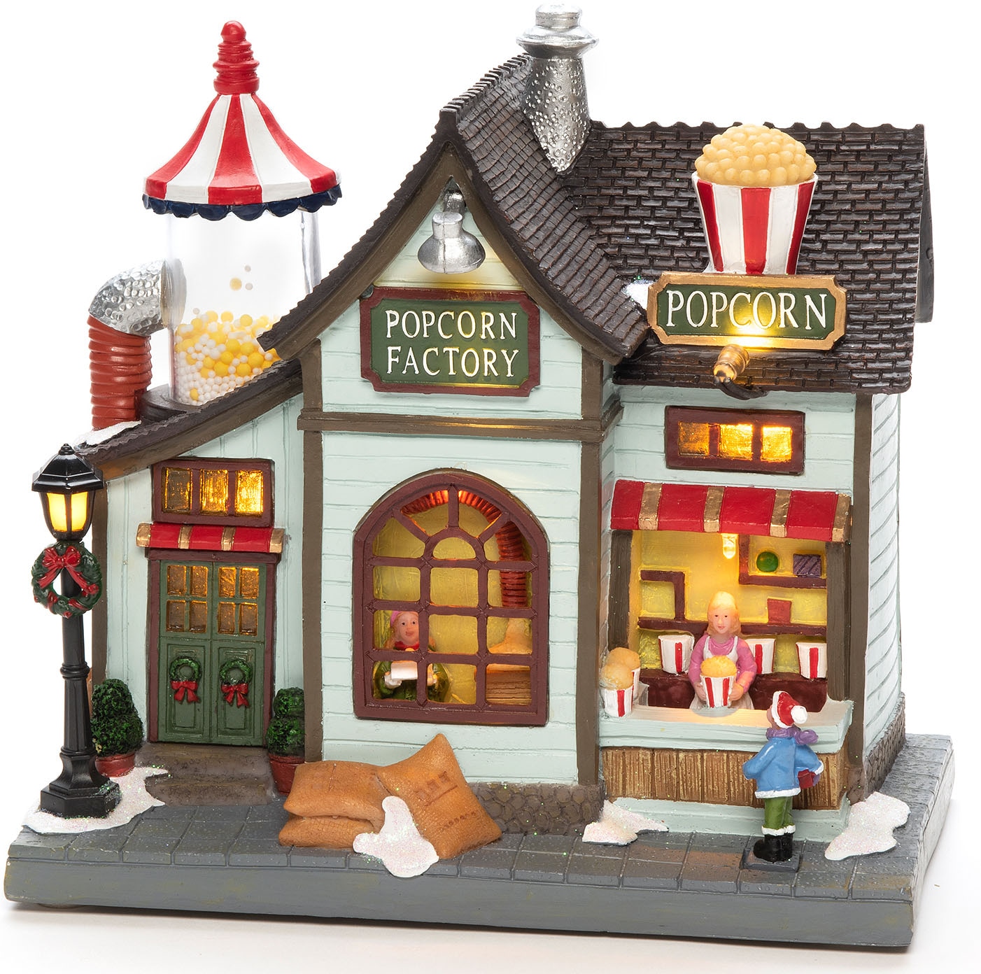 KONSTSMIDE Weihnachtshaus »Weihnachtsdeko«, LED Szenerie Popcornfabrik, mit Animation, 8 Weihnachtsliedern