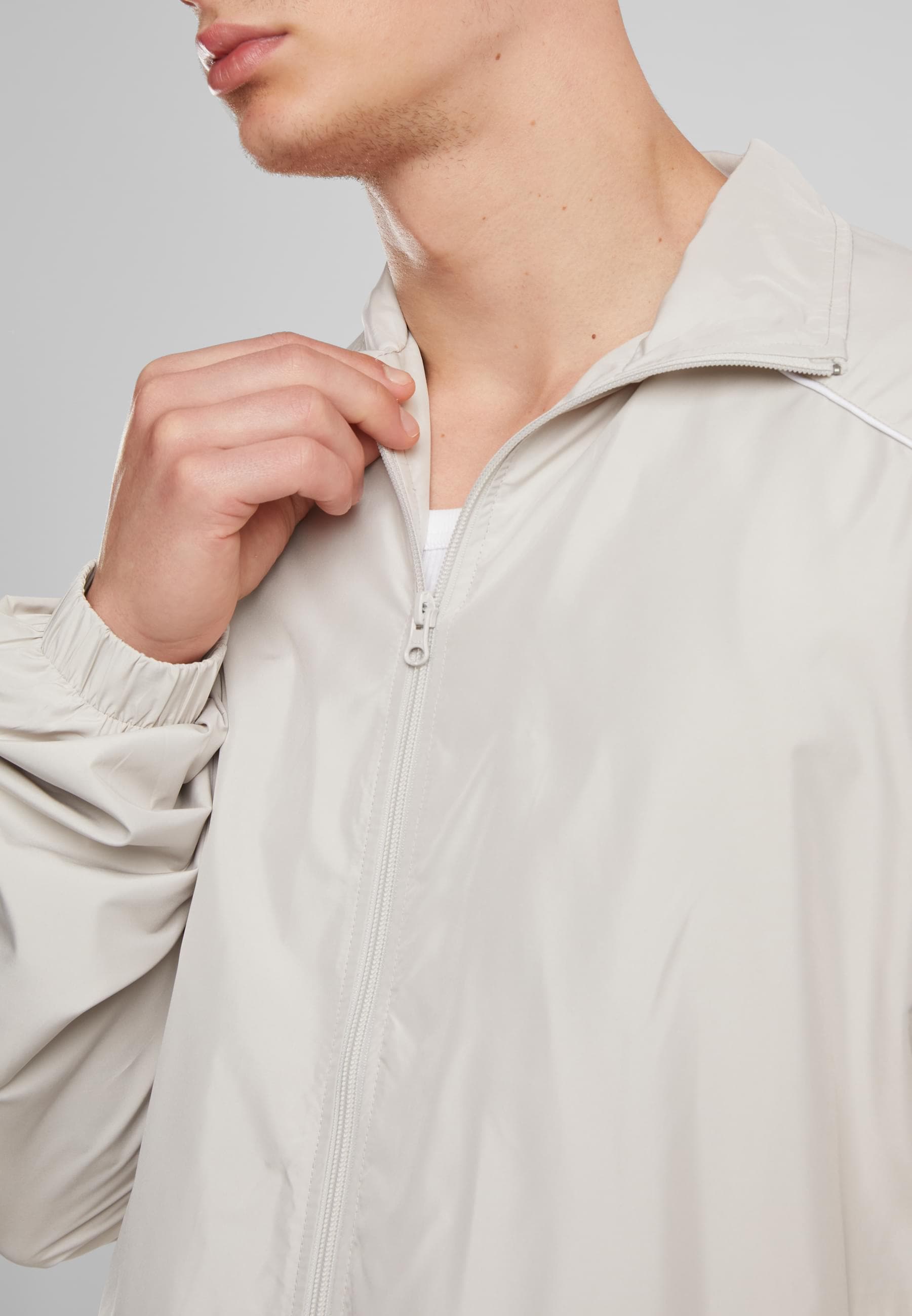 URBAN CLASSICS Trainingsjacke »Urban Classics Piped Panel Trackjacket« 1 Stk. tlg. ohne Kapuze