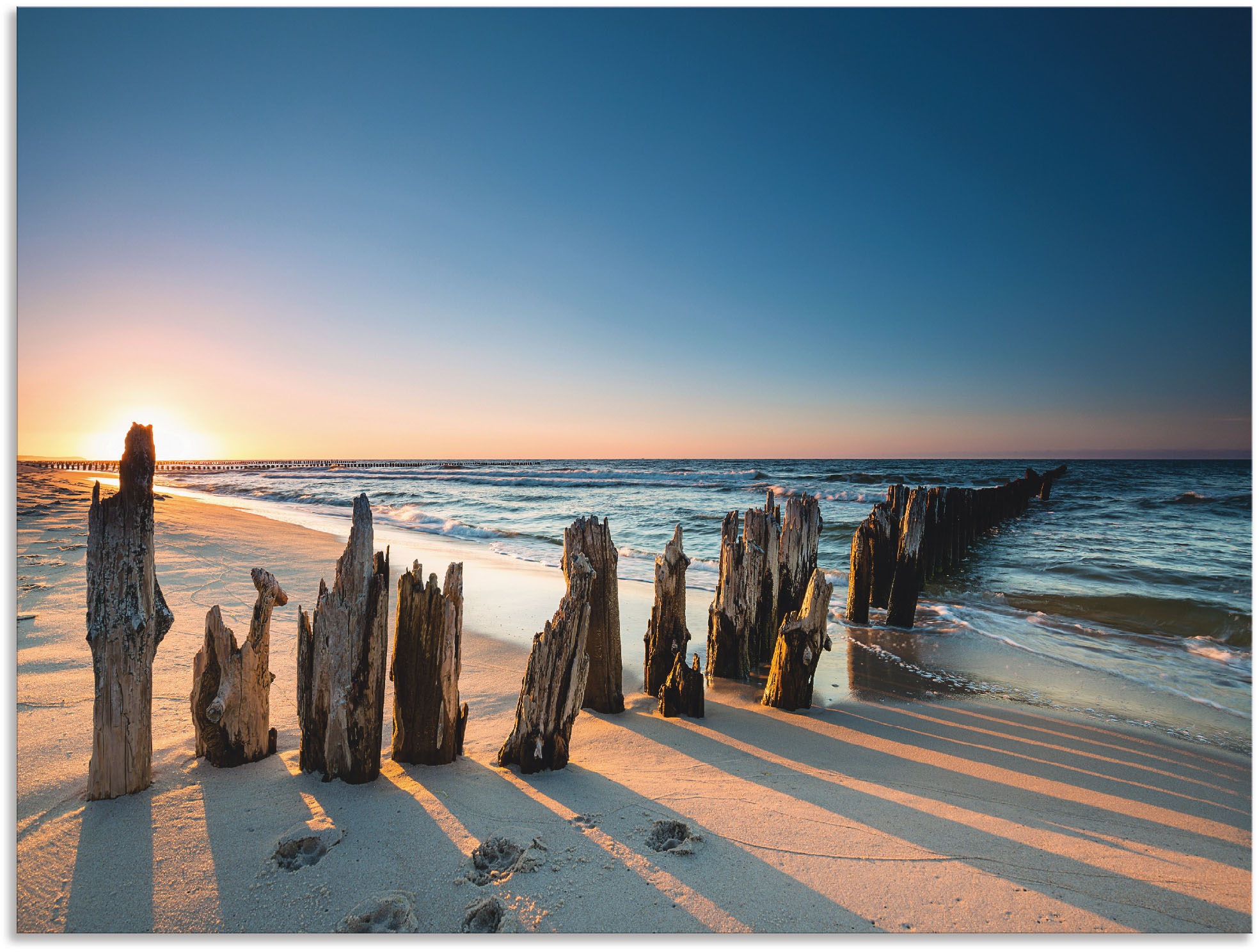 Artland Wandbild »Sonnenuntergang Strand Wellenbrecher« Meer Bilder 1 Stk. günstig online kaufen