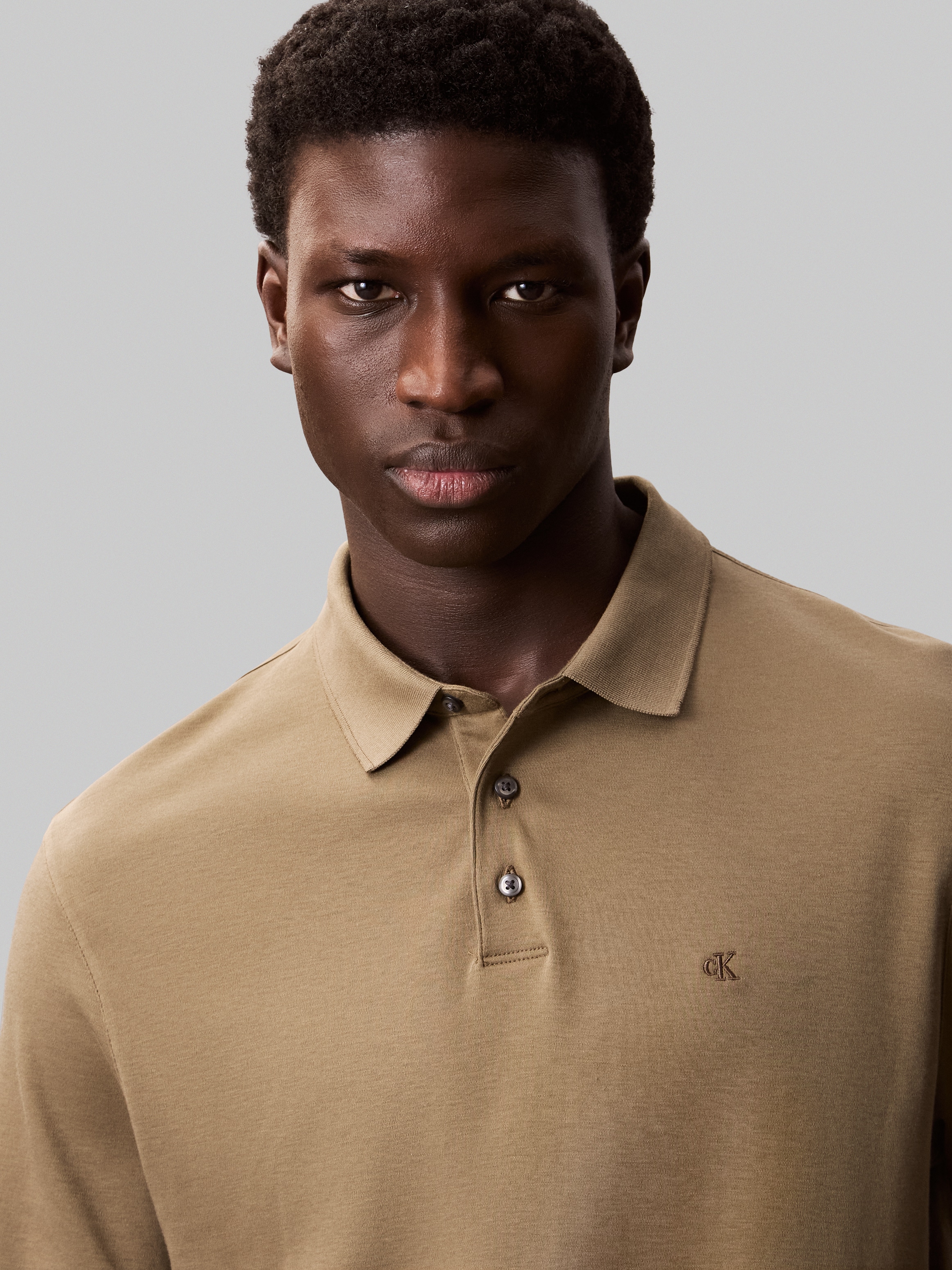 Calvin Klein Poloshirt »SS SUPIMA CHEST EMB POLO«, Mit Rundhalsausschnitt