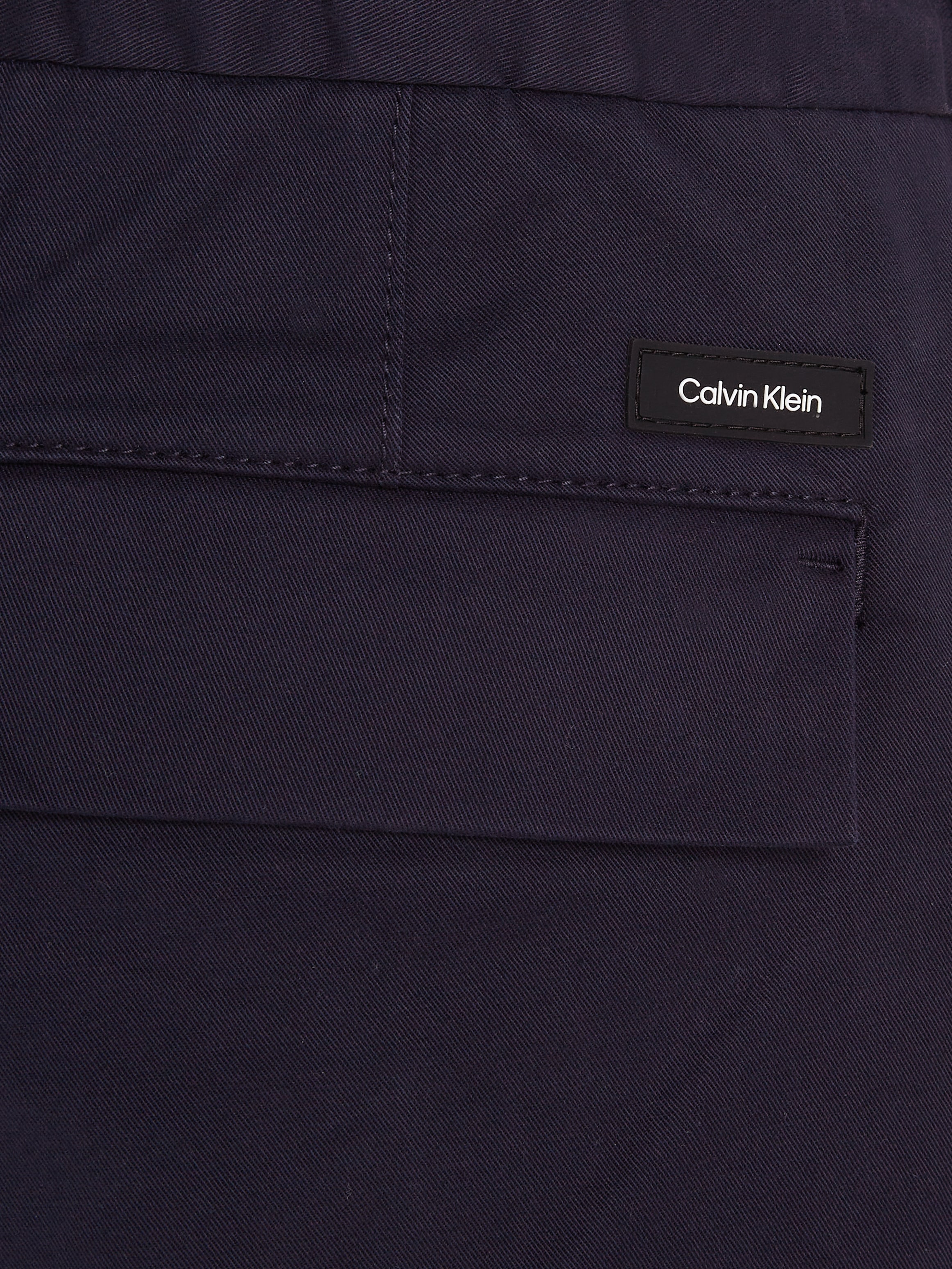 Calvin Klein Bügelfaltenhose »MODERN TWILL TAPERED PLEAT PANTS«  mit Logoprägung