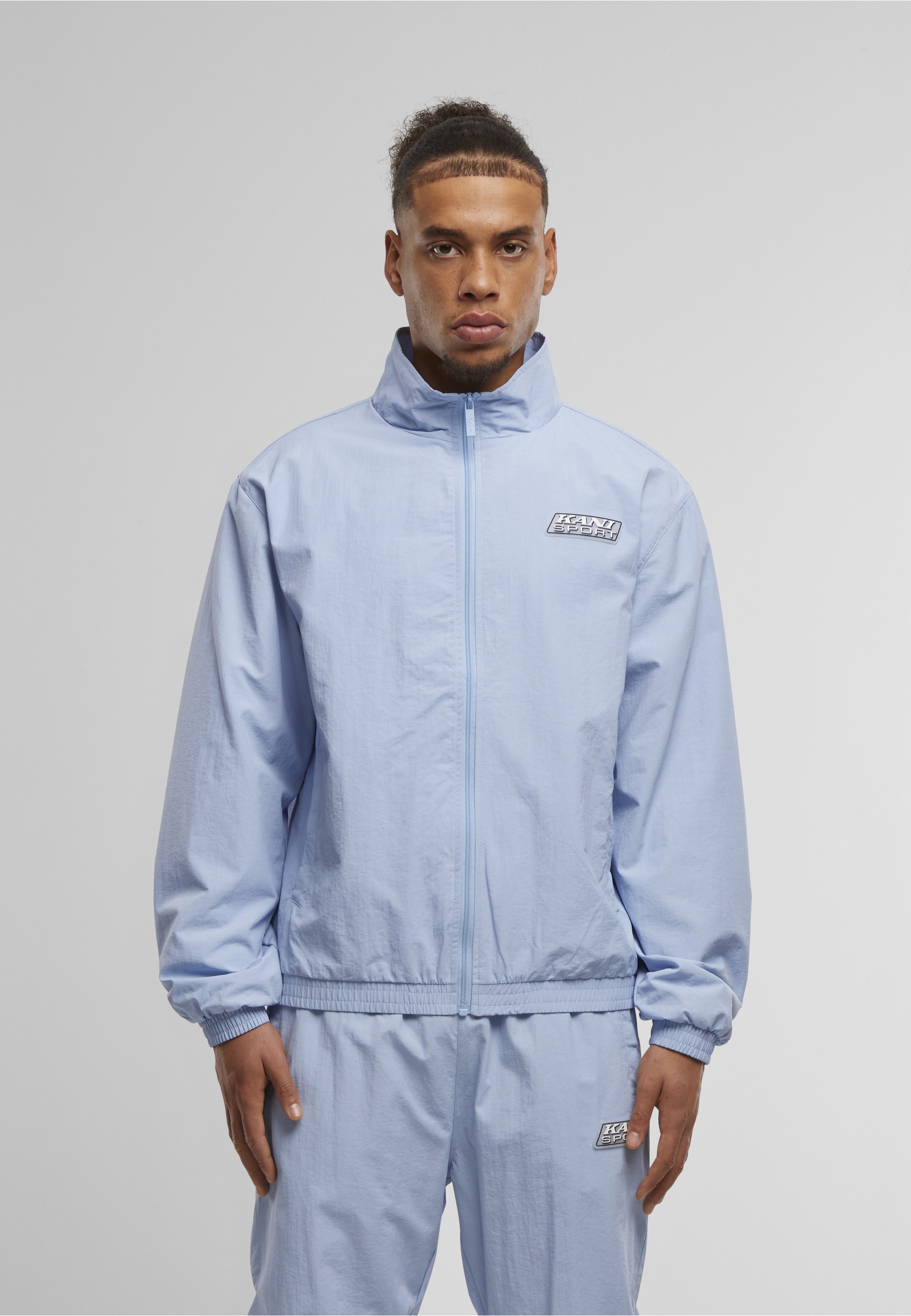 Karl Kani Trainingsjacke »Karl Kani Karl Kani Sport Patch Essential Trackjacket« 1 Stk. tlg. ohne Kapuze