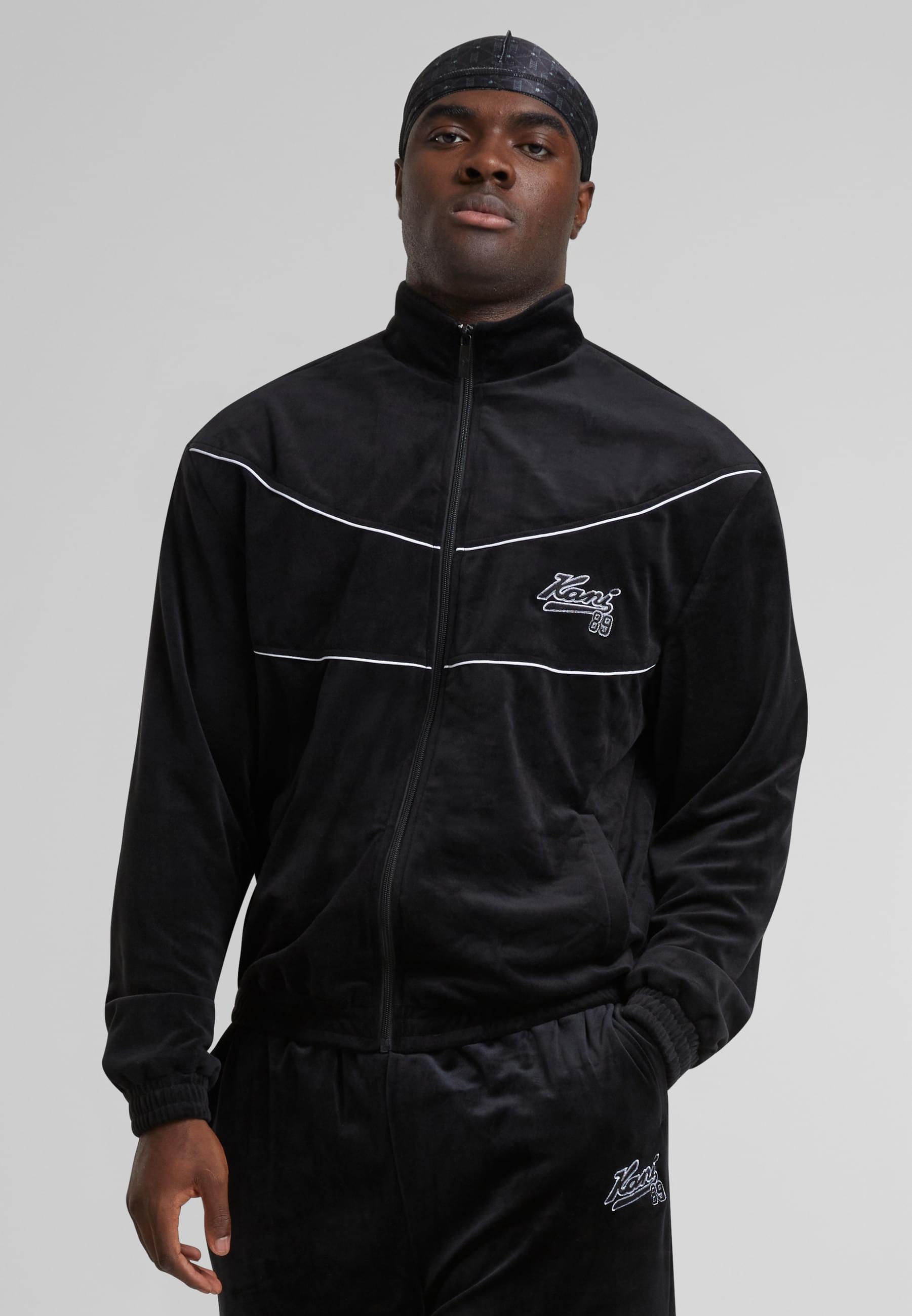 Karl Kani Trainingsjacke »Karl Kani KM251-011-2 Kani Varsity Velours Trackjacket« 1 Stk. tlg. ohne Kapuze