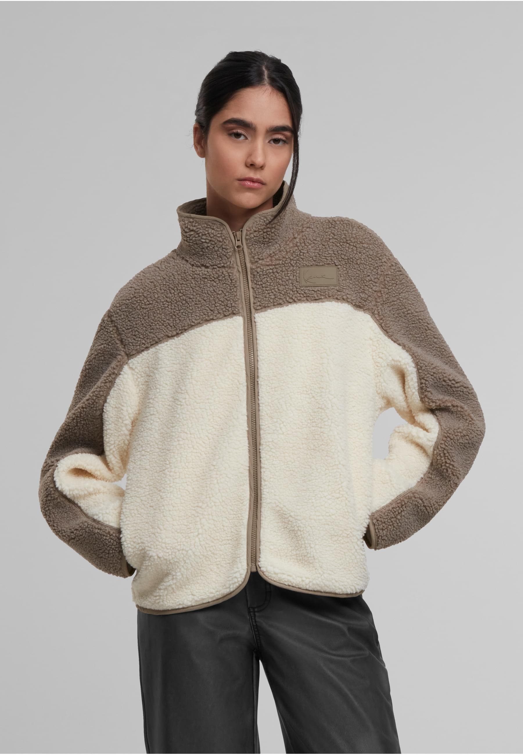 Karl Kani Trainingsjacke »Karl Kani Signature Teddy Trackjacket« 1 Stk. tlg. ohne Kapuze