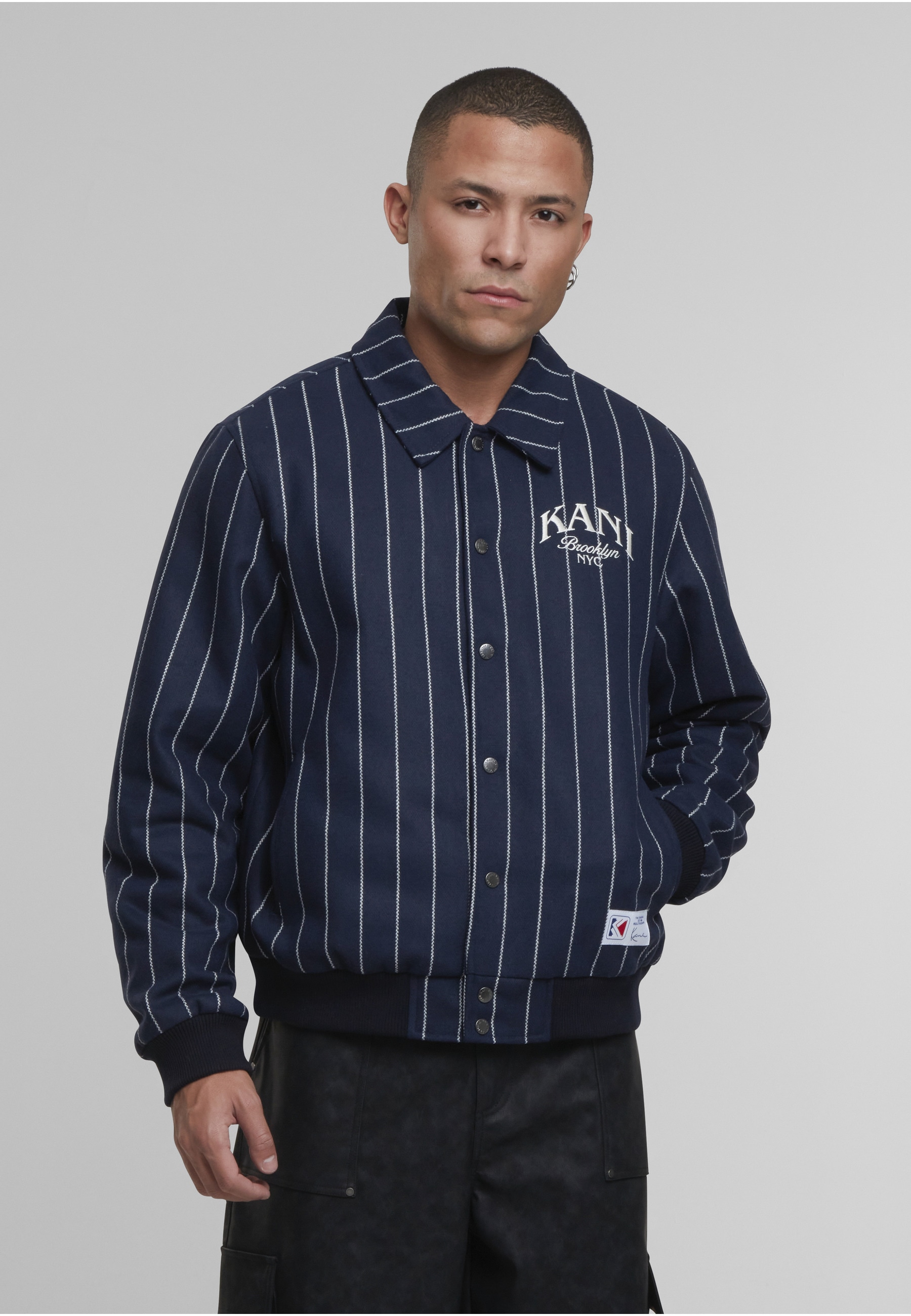 Karl Kani Winterjacke »Karl Kani Kani Pinstripes Wool Jacket« 1 Stk. tlg. ohne Kapuze