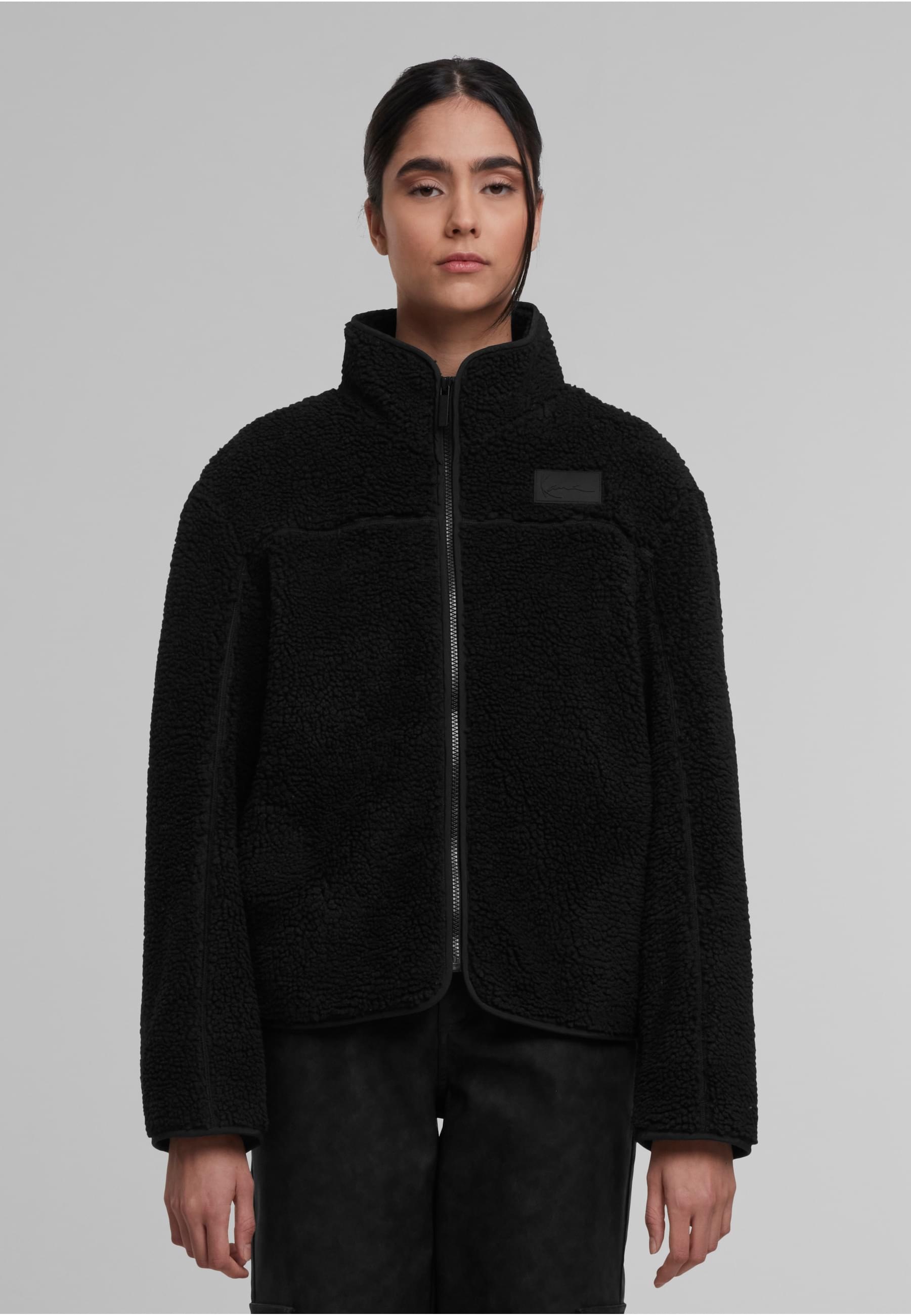 Karl Kani Trainingsjacke »Karl Kani Signature Teddy Trackjacket« 1 Stk. tlg. ohne Kapuze