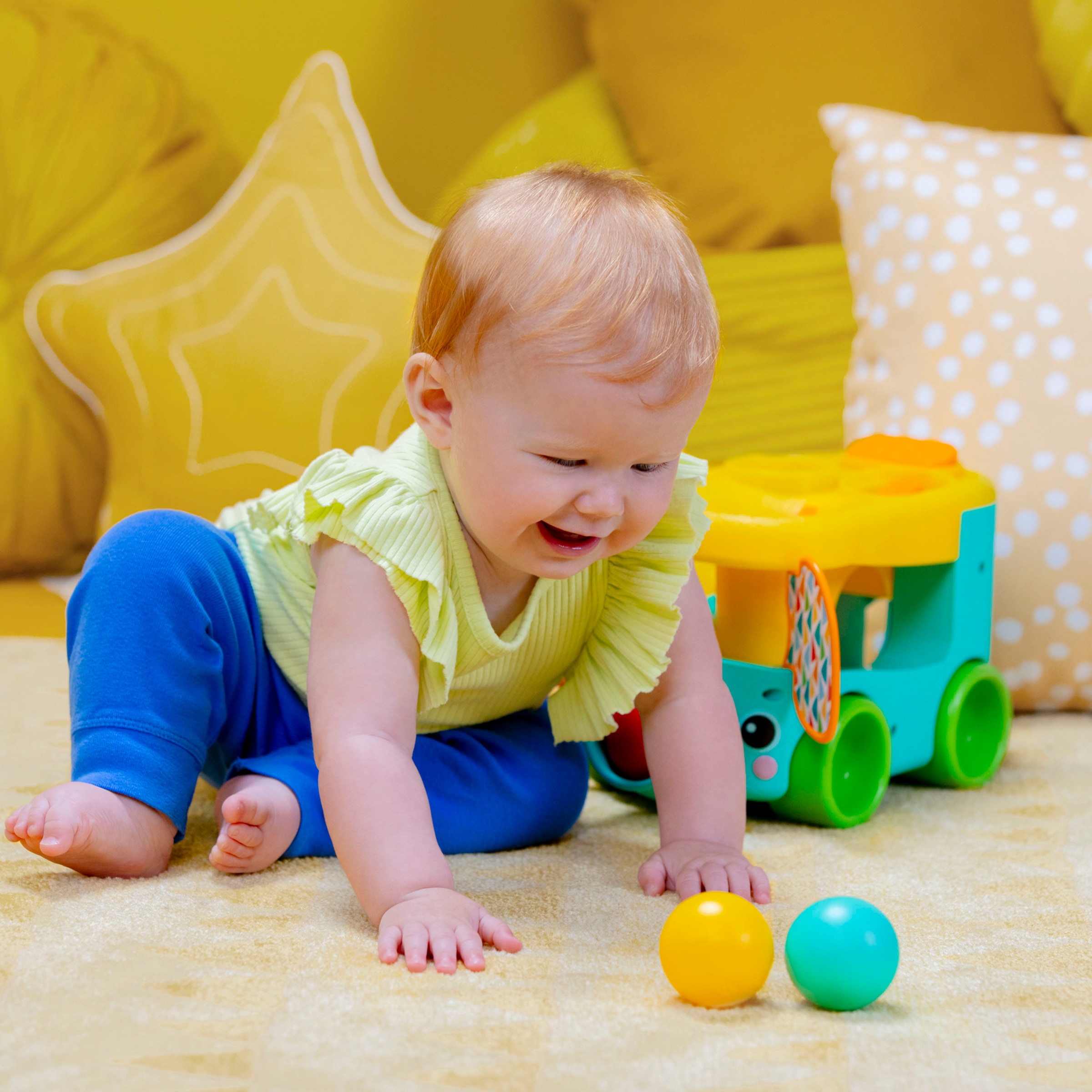 Bright Starts Lernspielzeug »Pop & Roll Safari Bus Ball Play Toy«, mit Licht und Sound
