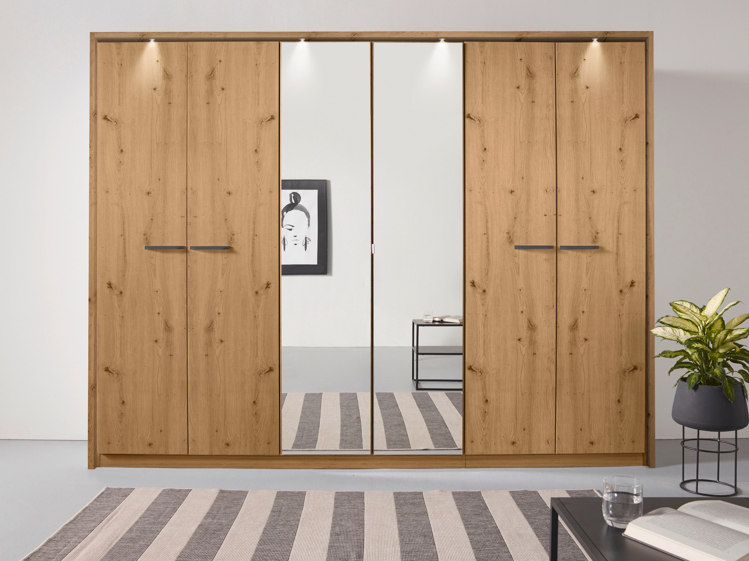rauch Drehtürenschrank »Oteli«, mit Mittelspiegel und Passepartout optional mit Beleuchtung