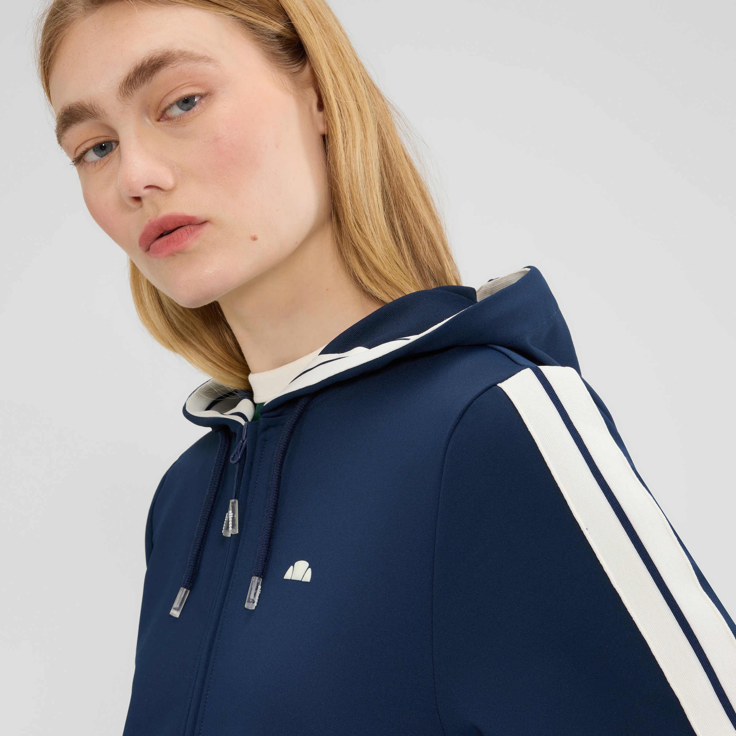 Ellesse Trainingsjacke »SAINCOME TRACK JACKET« mit Vollreißverschluss, aus Polyester und Elasthan