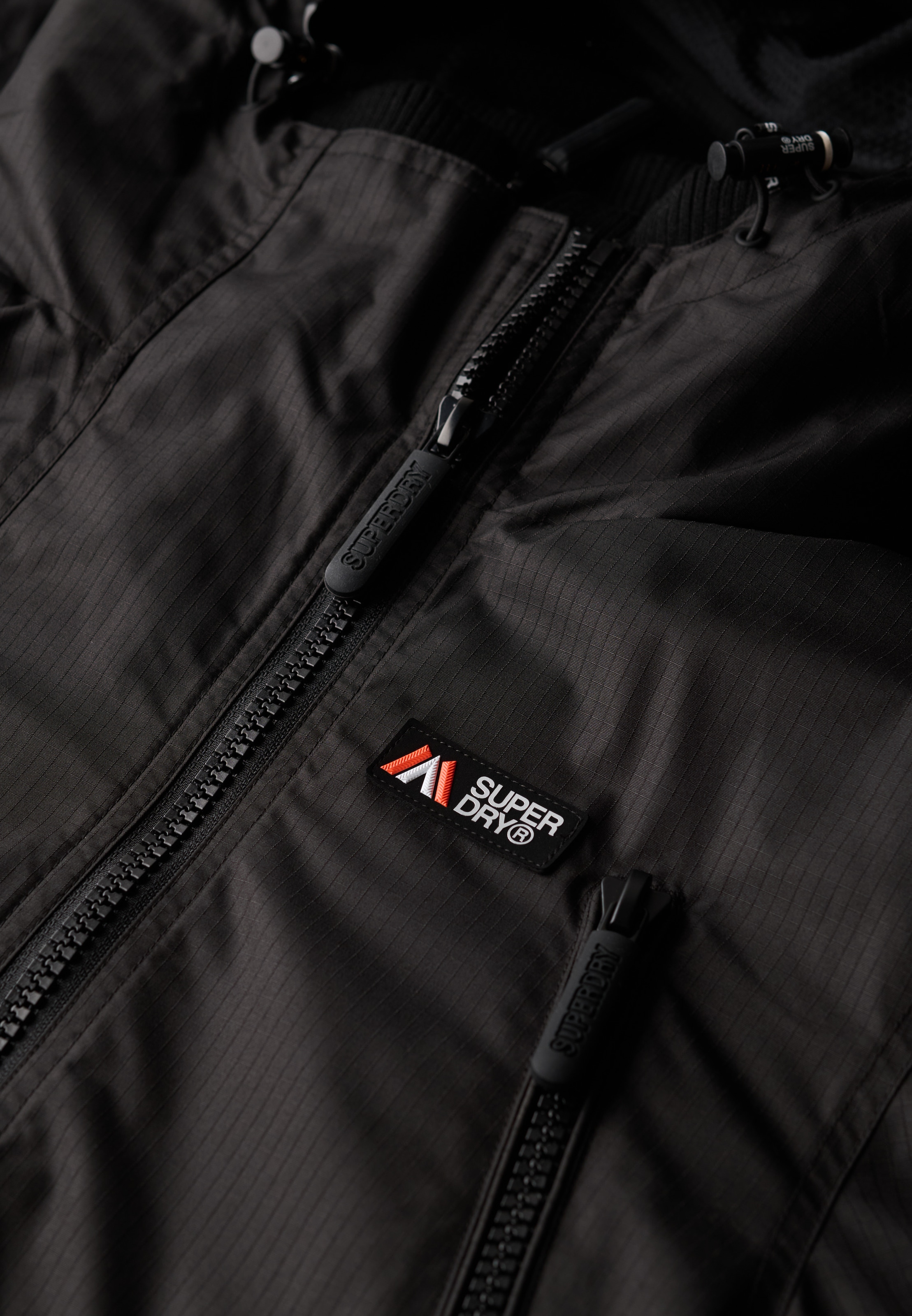 Superdry Outdoorjacke »HOODED MTN WINDBREAKER JACKET«, mit Kapuze