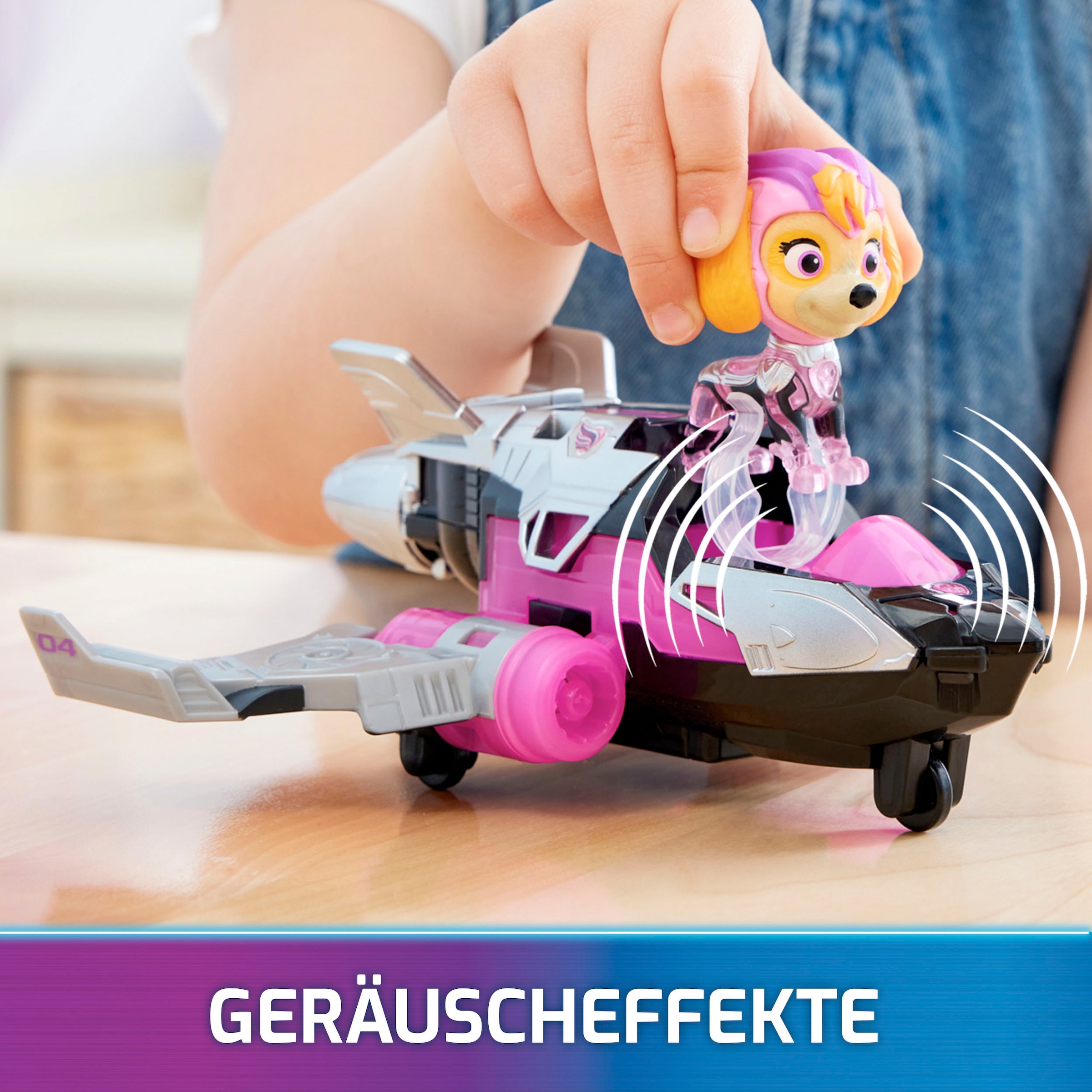 Spin Master Spielzeug-Auto »Paw Patrol - Movie II - Basic Themed Vehicles Skye«, Flugzeug mit Welpenfigur, Licht- und Soundeffekt