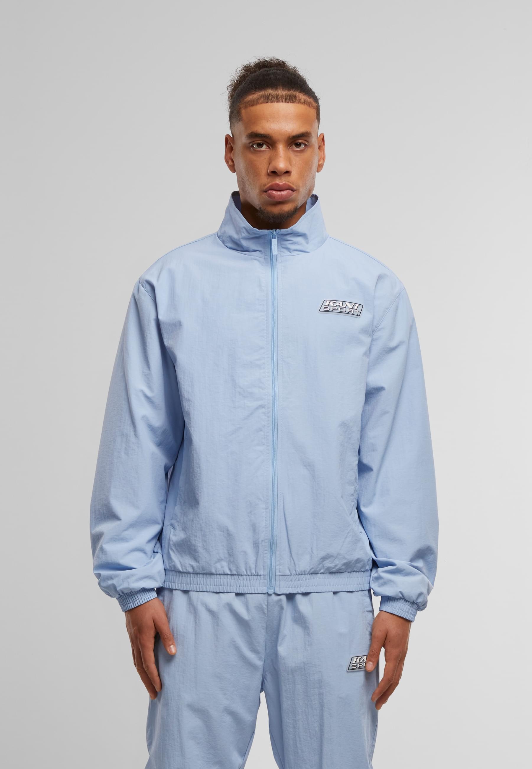 Karl Kani Trainingsjacke »Karl Kani KM-JK035--090-32 Sport Patch Essential Trackjacket« 1 Stk. tlg. ohne Kapuze