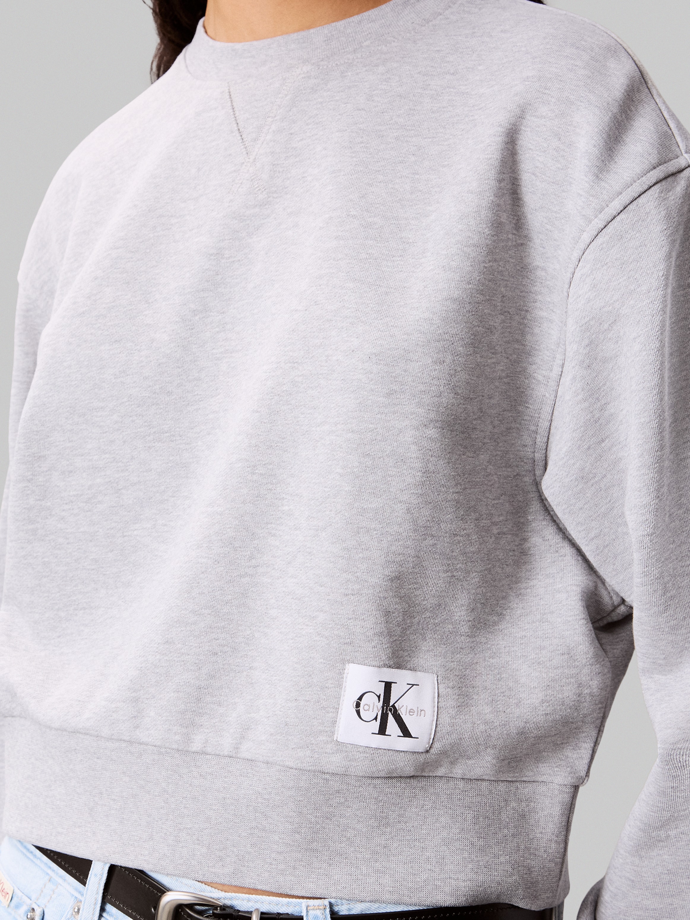 Calvin Klein Jeans Sweatshirt »FRENCH TERRY WOVEN LABEL CREW«, Regular fit mit Rundhalsausschnitt
