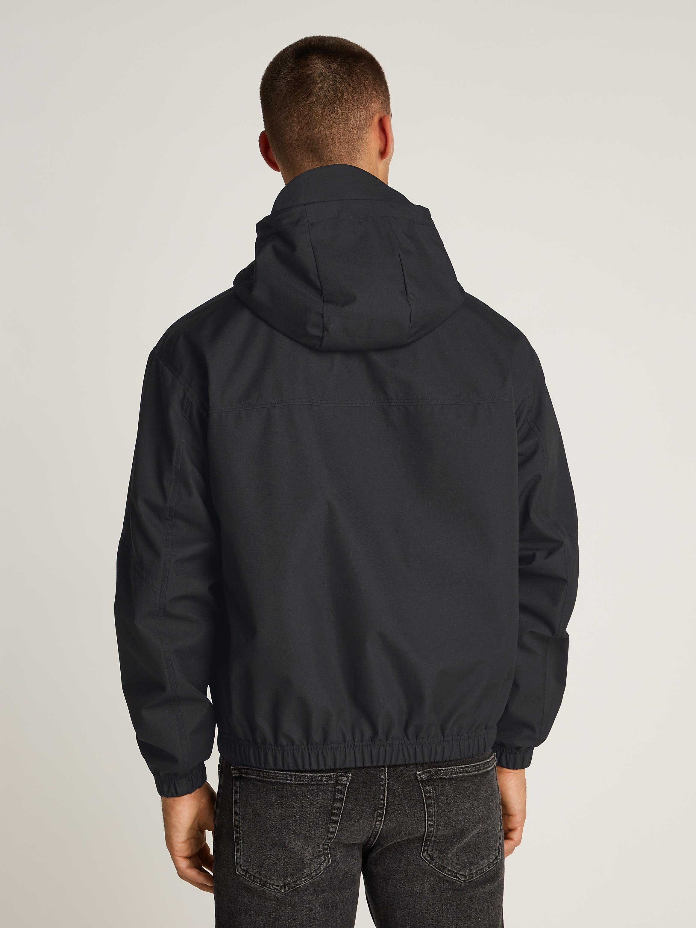Calvin Klein Jeans Allwetterjacke »TECHNICAL JACKET«, mit Kapuze, Logodruck, Eingriffstaschen