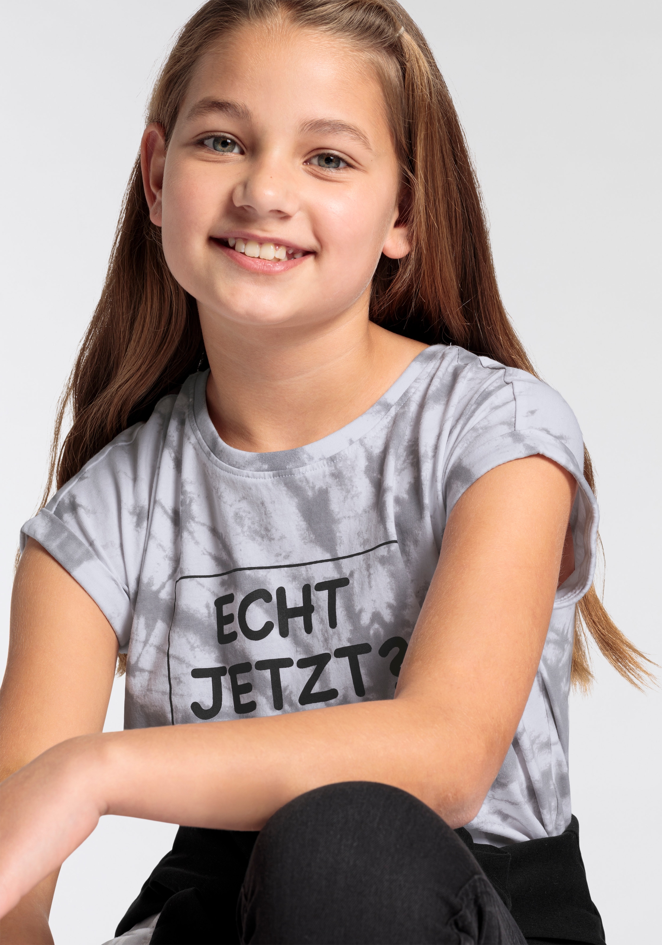 KIDSWORLD T-Shirt »ECHT JETZT?«, Kurzarm, lässige Passform, mit Allover-Druck und Statements