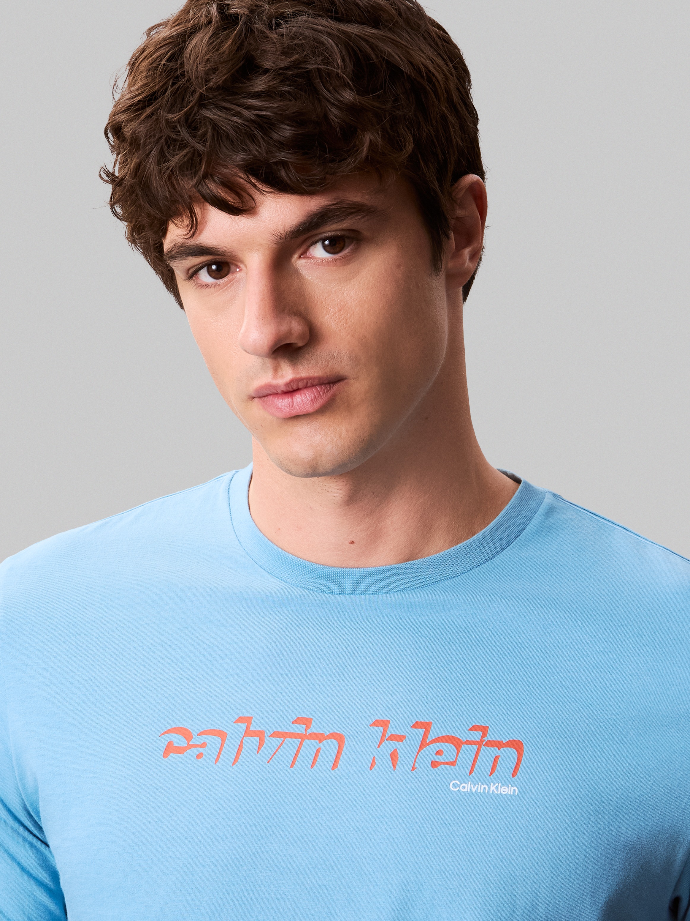 Calvin Klein Jeans T-Shirt »SS 30s E CLVN LN 3D«, Mit Rundhalsausschnitt