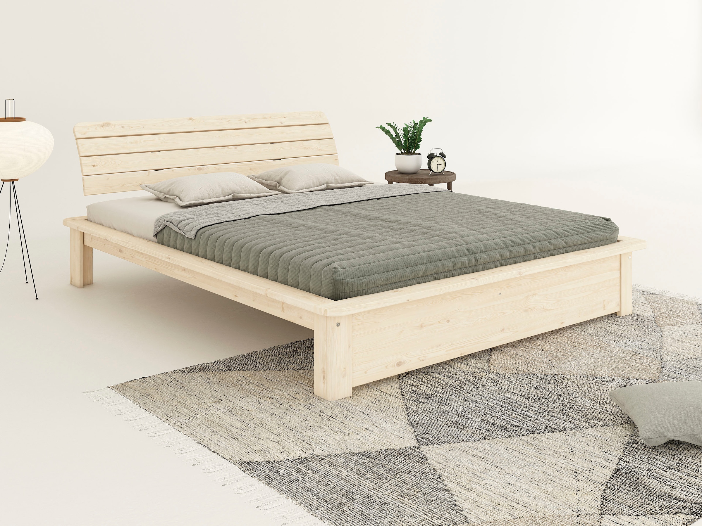 Home affaire Massivholzbett »Antri, Futonbett, ergonomisch geformtes Kopfteil, stilvolles Design« Rahmen zur Ablage von Smartphone, mit Lattenrost, Bettkasten optional