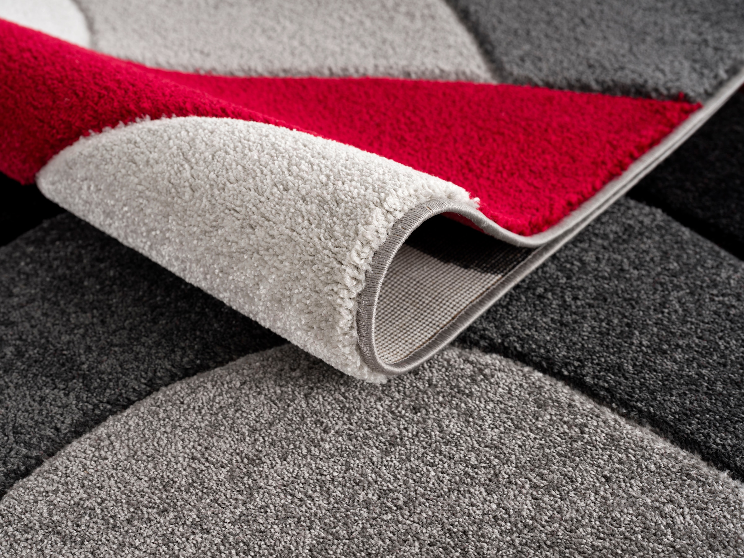 andas Teppich »Neele«, rechteckig, Wellen-Design, mit handgearbeitetem  Konturenschnitt, Wende-Teppich auf Rechnung bestellen