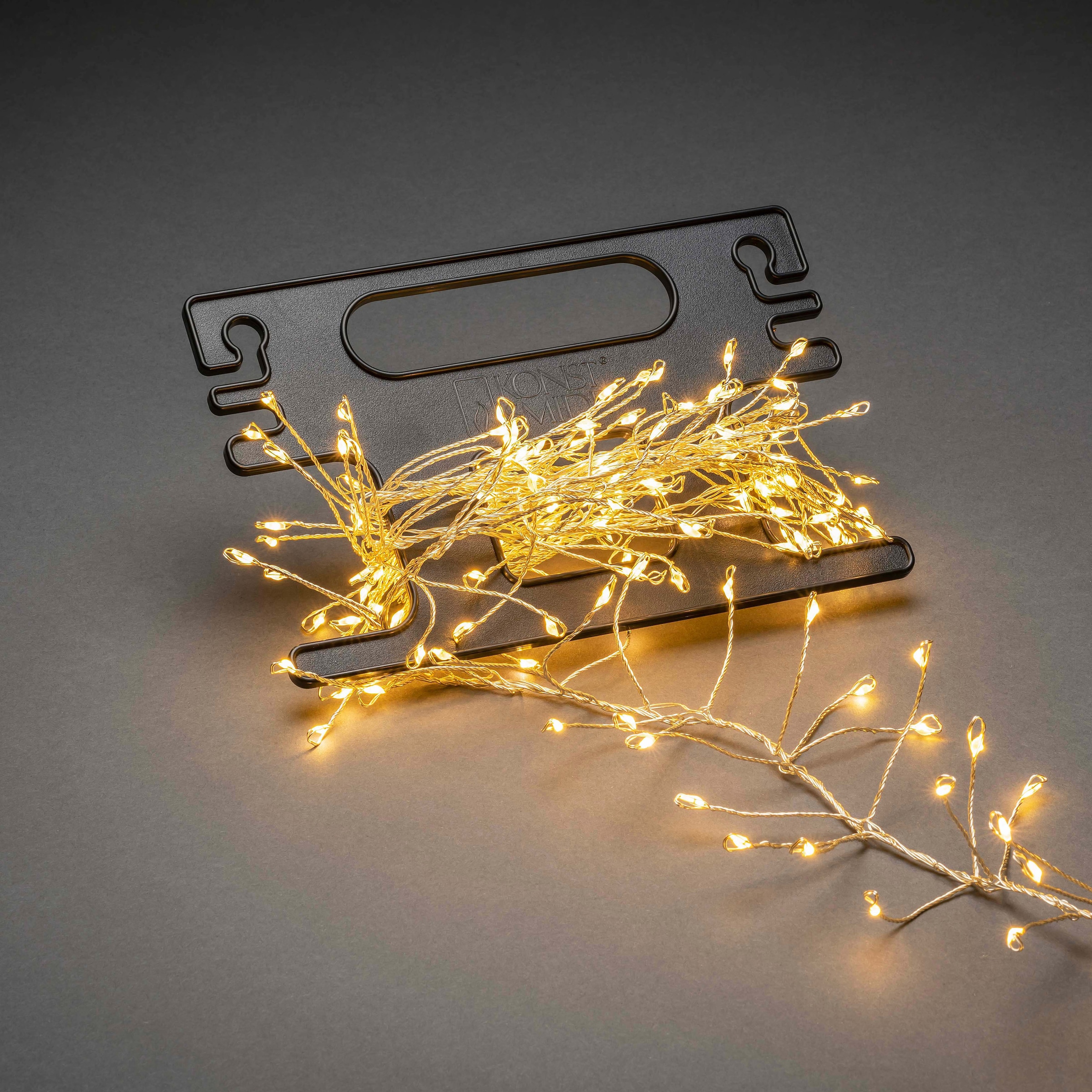 KONSTSMIDE LED-Lichterkette »Weihnachtsdeko aussen«, 200 St.-flammig, Micro LED Büschellichterkette Cluster, mit Aufroller