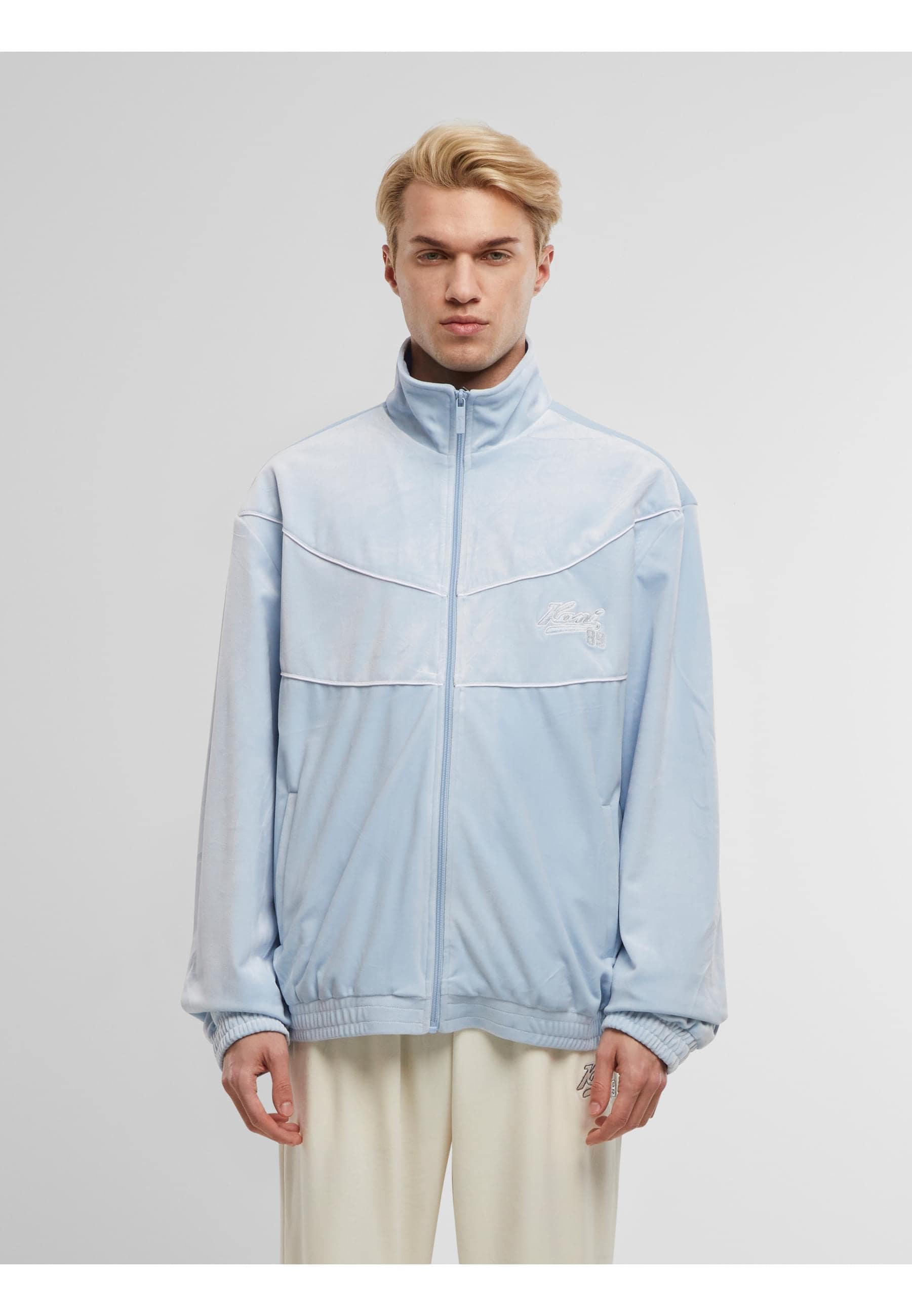 Karl Kani Trainingsjacke »Karl Kani KM251-011-1 Sport Patch Essential Trackjacket« 1 Stk. tlg. ohne Kapuze