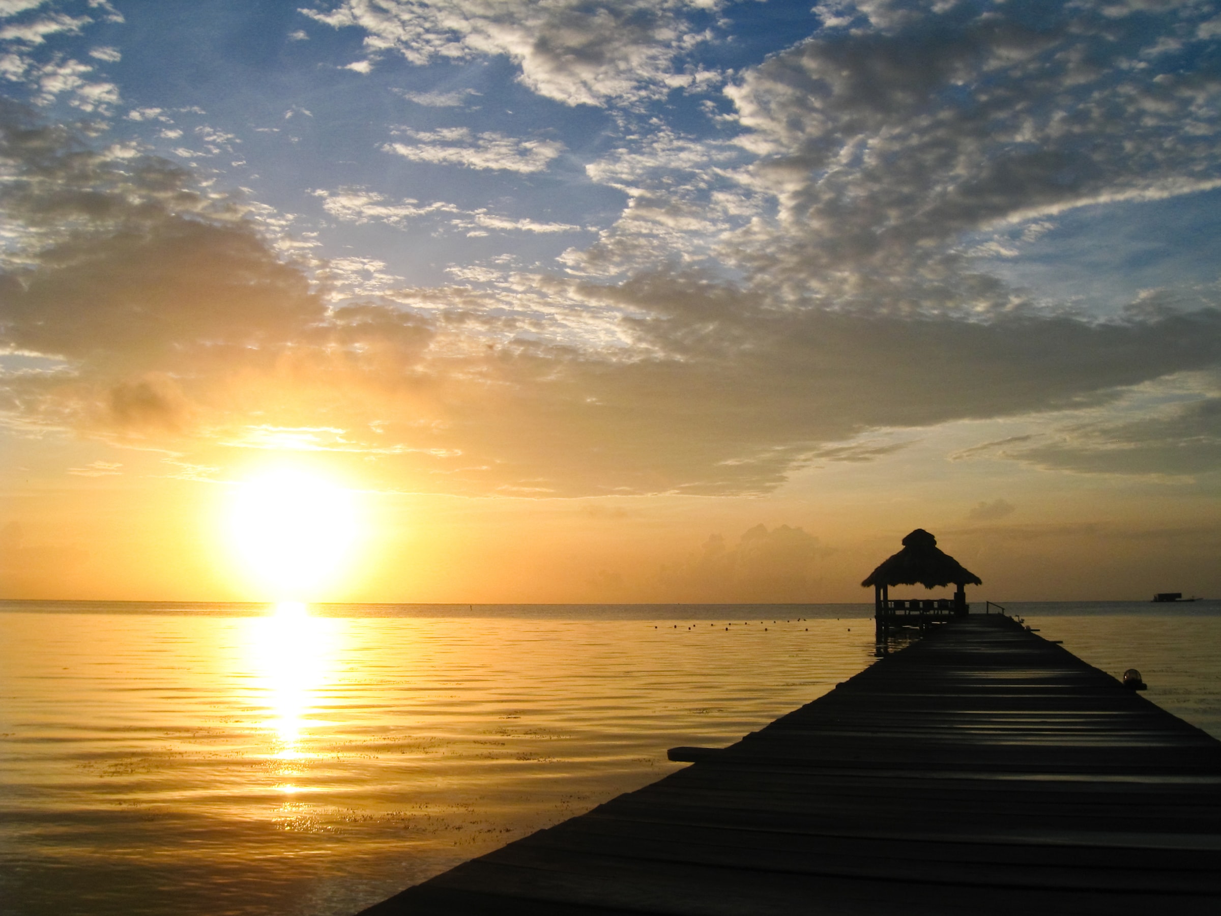 Papermoon Fototapete »Sunburst over Belize« glatt günstig online kaufen