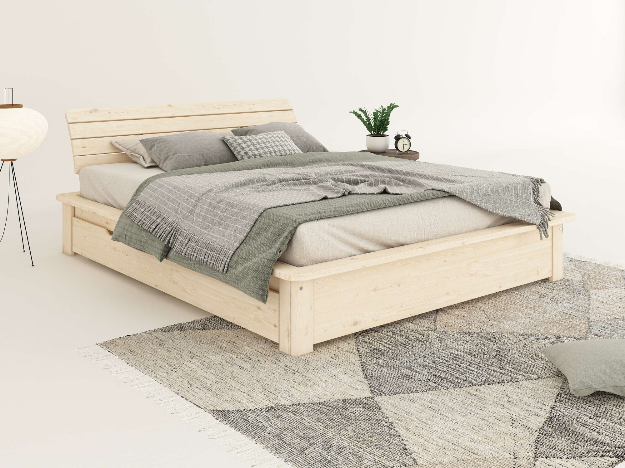 OTTO home Massivholzbett »Antri, Futonbett, ergonomisch geformtes Kopfteil, stilvolles Design« Rahmen zur Ablage von Smartphone, mit Lattenrost, Bettkasten optional