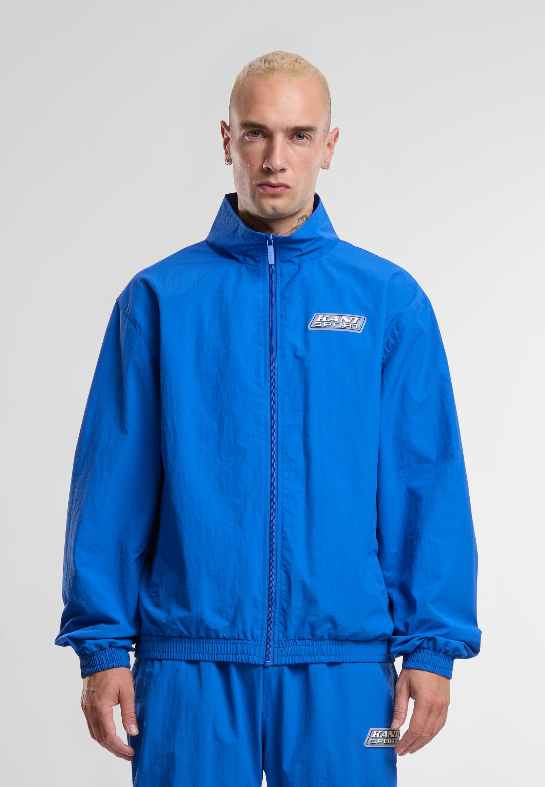 Karl Kani Trainingsjacke »Karl Kani Sport Patch Essential Trackjacket« 1 Stk. tlg. ohne Kapuze