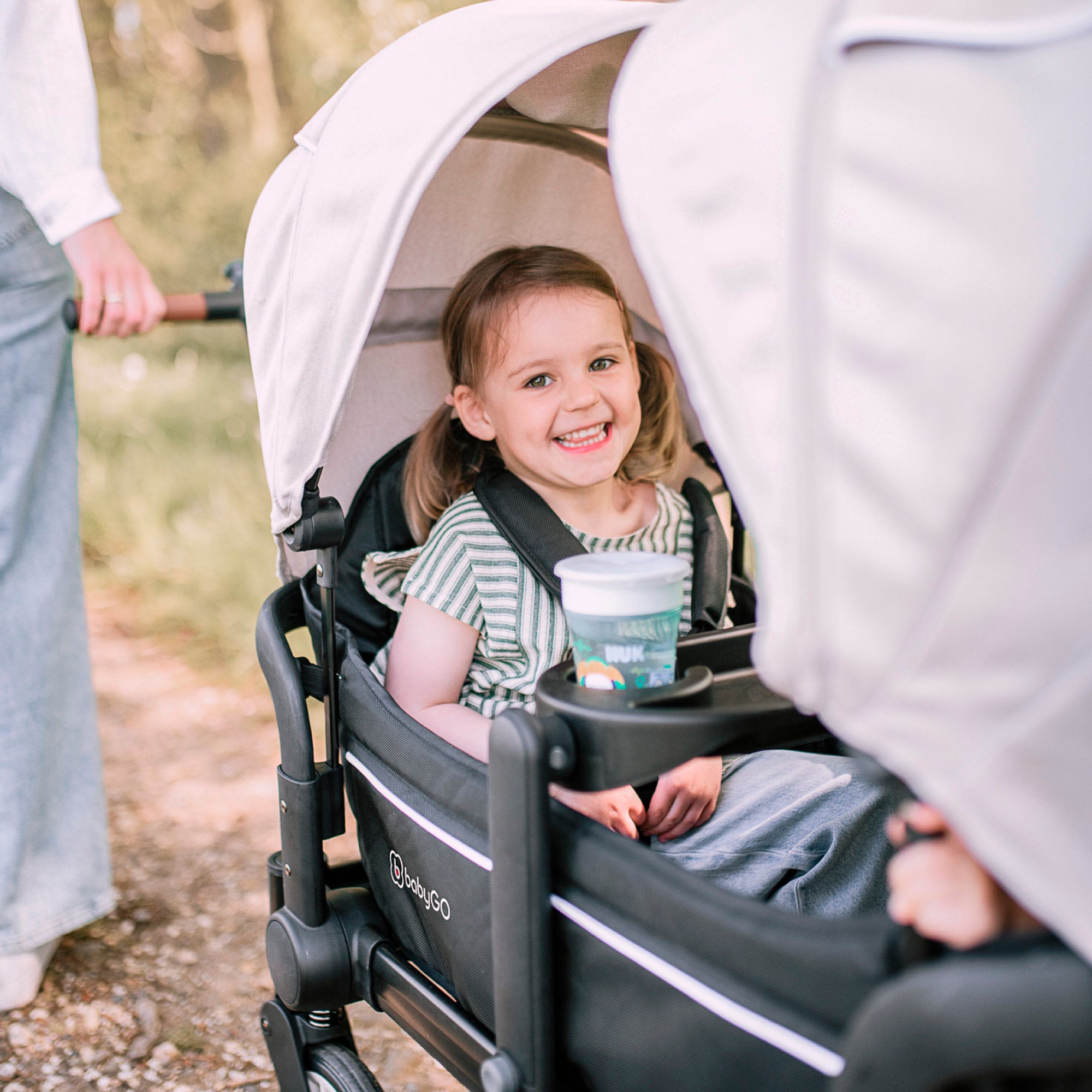 BabyGo Bollerwagen »Cozy Rider«, (Set, 7 tlg., inkl. 2x Sonnenschutz, Tisch, Moskito- u. Regenschutz, Flaschenhalter), klein zusammenfaltbar