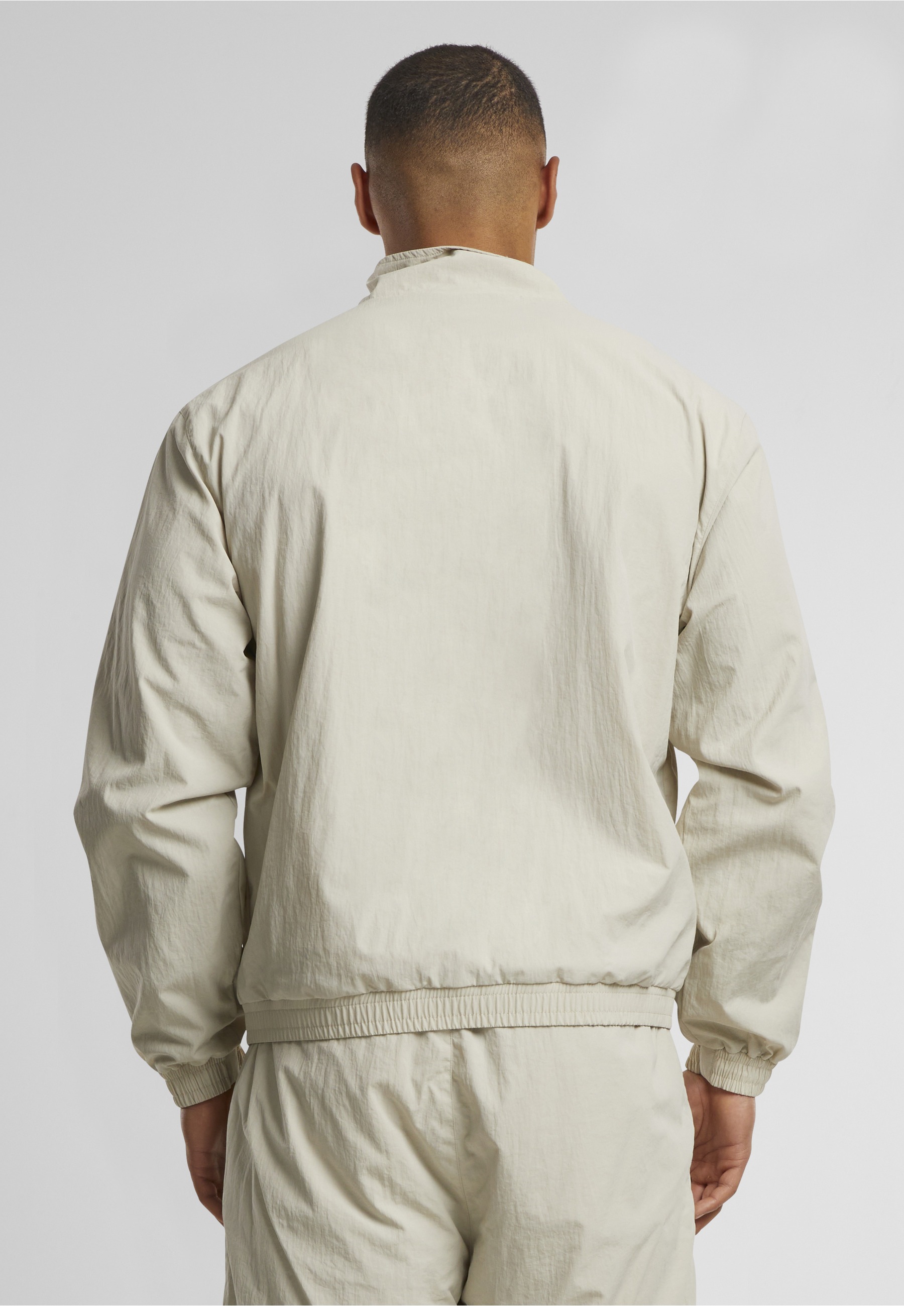 Karl Kani Trainingsjacke »Karl Kani Sport Patch Essential Trackjacket« 1 Stk. tlg. ohne Kapuze