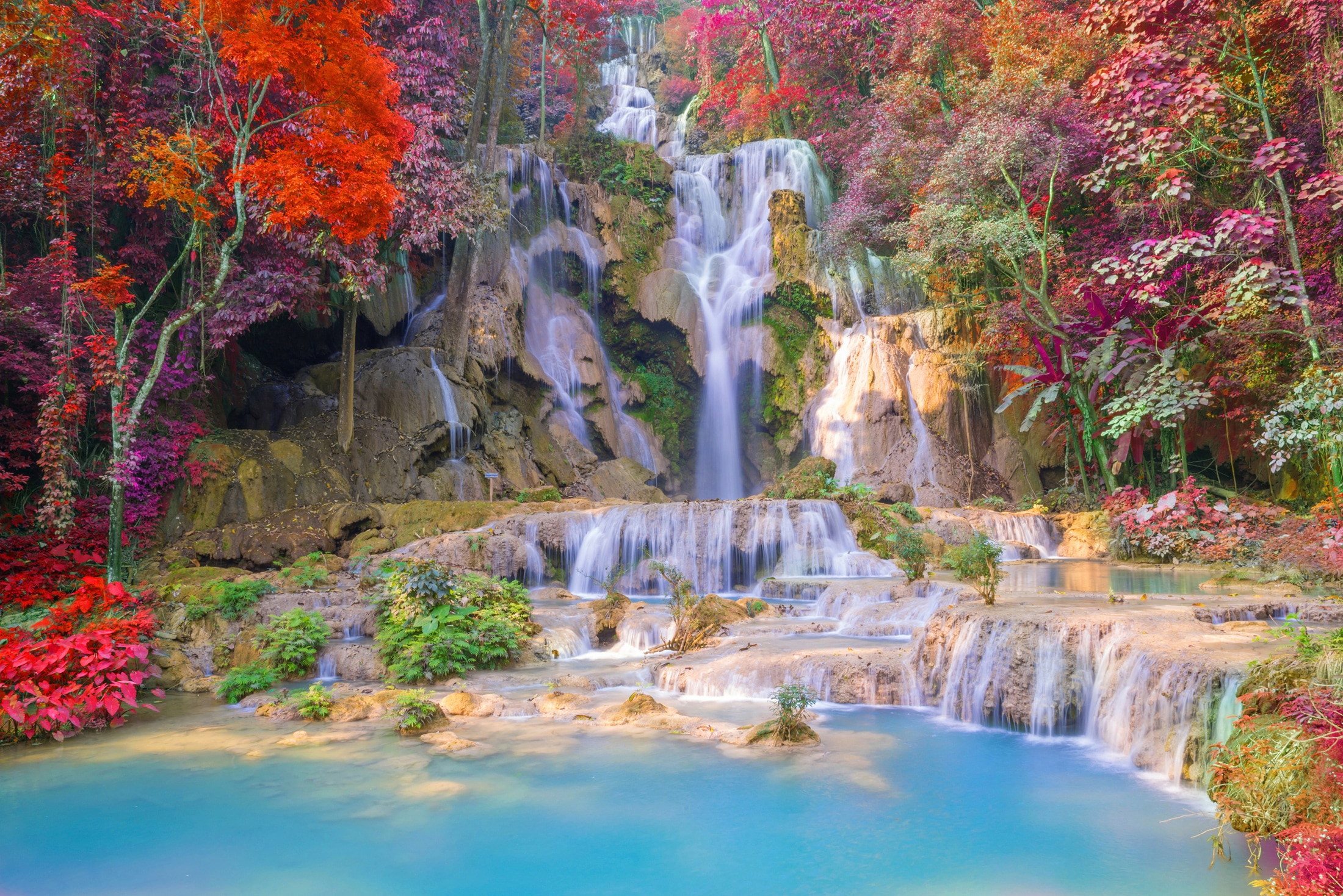 Papermoon Fototapete »WASSERFALL-BÄUME FLUSS SEE STEINE BLUMEN BERGE HERBST günstig online kaufen