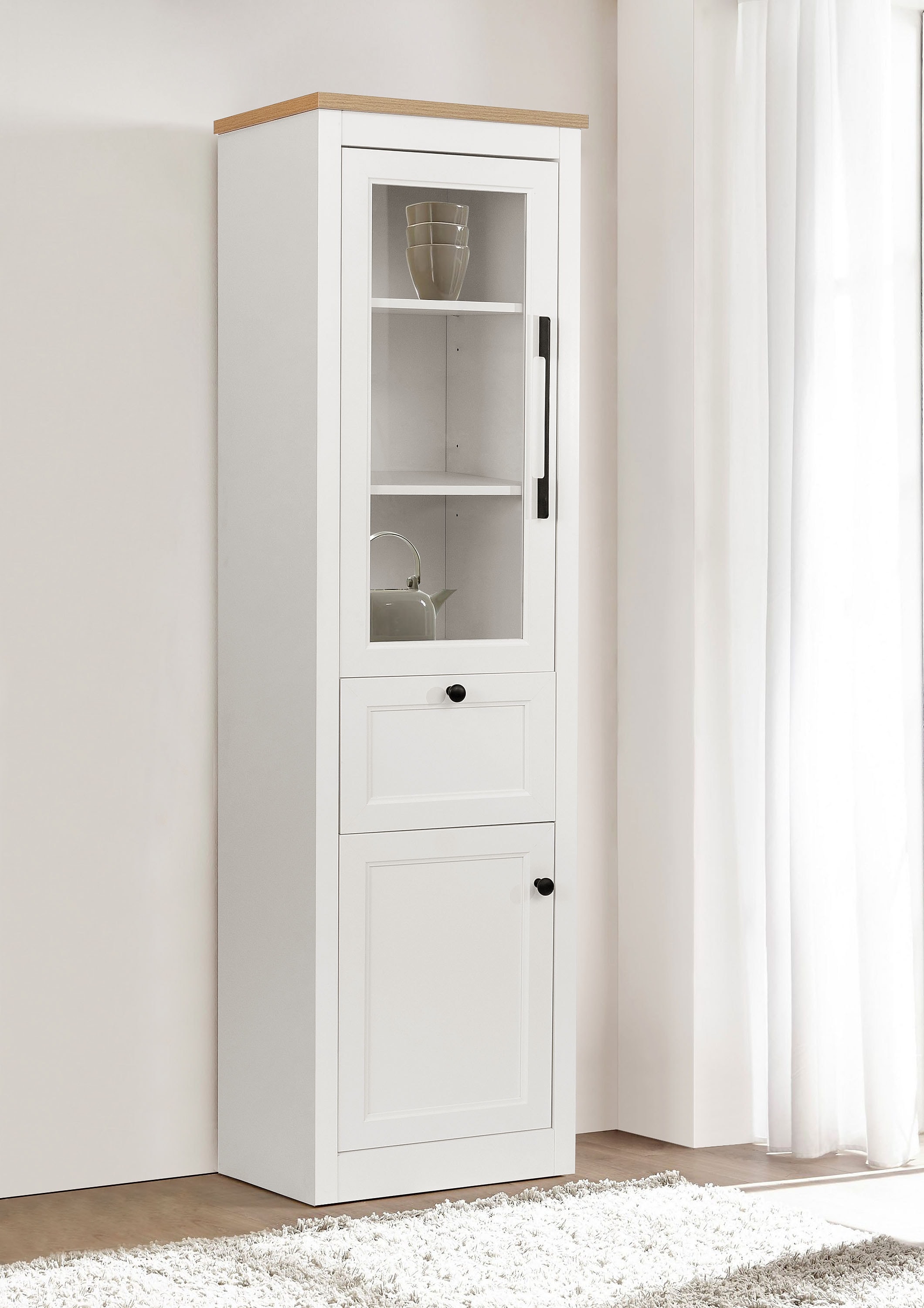 OTTO home Vitrine »Ismund« aus MDF, mit Holz-Zierleiste, schwarzen Metallgr günstig online kaufen